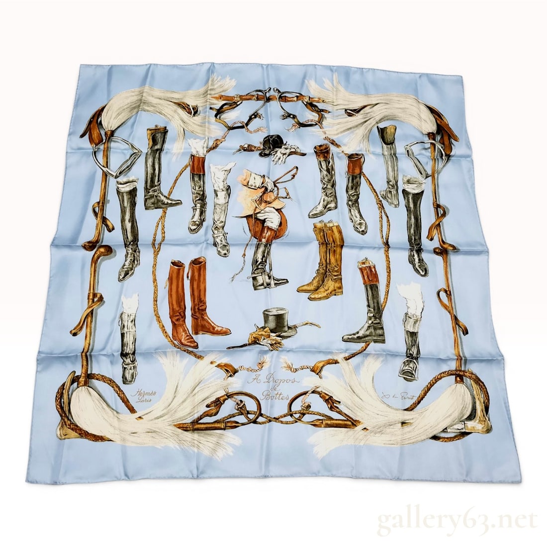 Hermes Xavier de Poret A Propos de Bottes Silk Scarf: Hermès silk twill carré in the À Propos de Bottes pattern, originally designed by Xavier de Poret in 1962. The design features a pale blue ground decorated with various equestrian