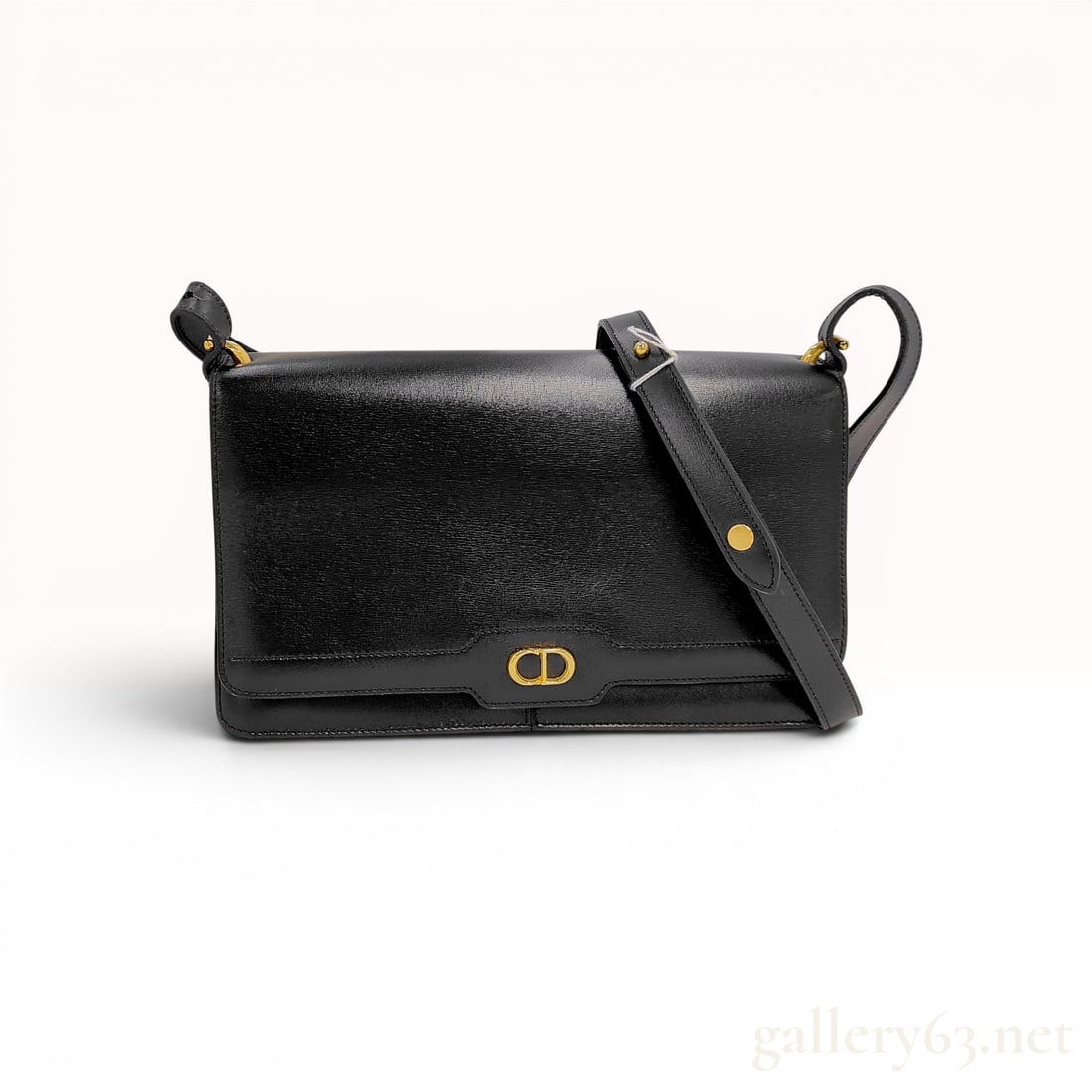 Christian Dior Black Leather Vintage CD Logo Shoulder Bag with Retail Tag: Christian Dior vintage envelope-style shoulder bag crafted from smooth black leather featuring gold-tone hardware. The rectangular silhouette includes a front flap with magnetic closure, a central &qu