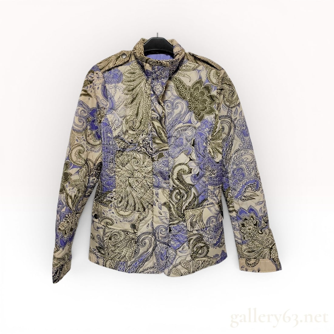 Etro Milano Quilted Paisley Print Field Jacket, Size 42: This quilted field-style jacket is by Etro, Milano. It features a signature all-over paisley print in shades of periwinkle blue, olive green, cream, and tan. The garment is constructed with a polyamid