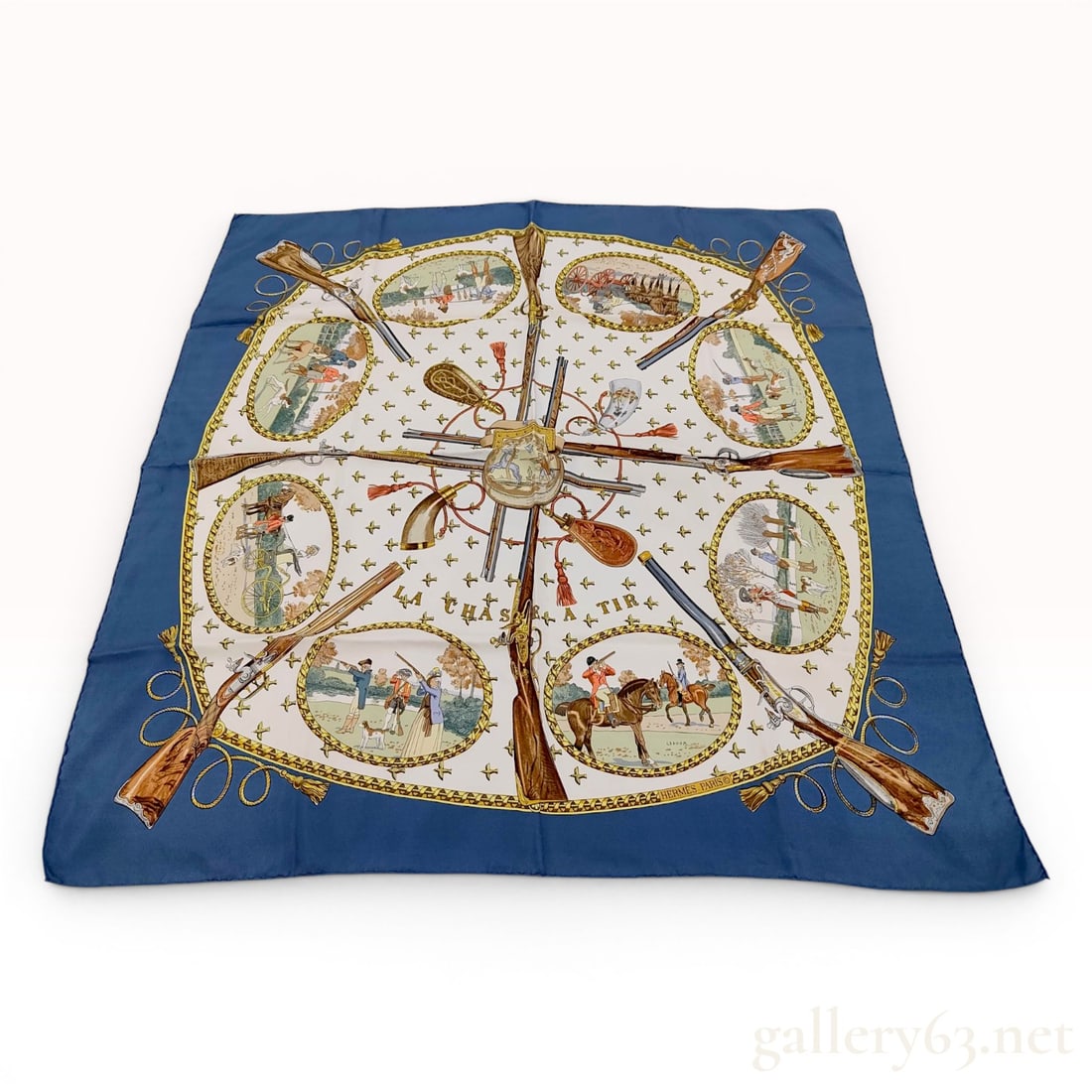 Hermes La Chasse a Tir Silk Scarf by Philippe Ledoux: A vintage Hermès silk twill scarf titled La Chasse a Tir (The Shooting Hunt), designed by artist Philippe Ledoux. The scarf features a white central field decorated with repeating bird flight m