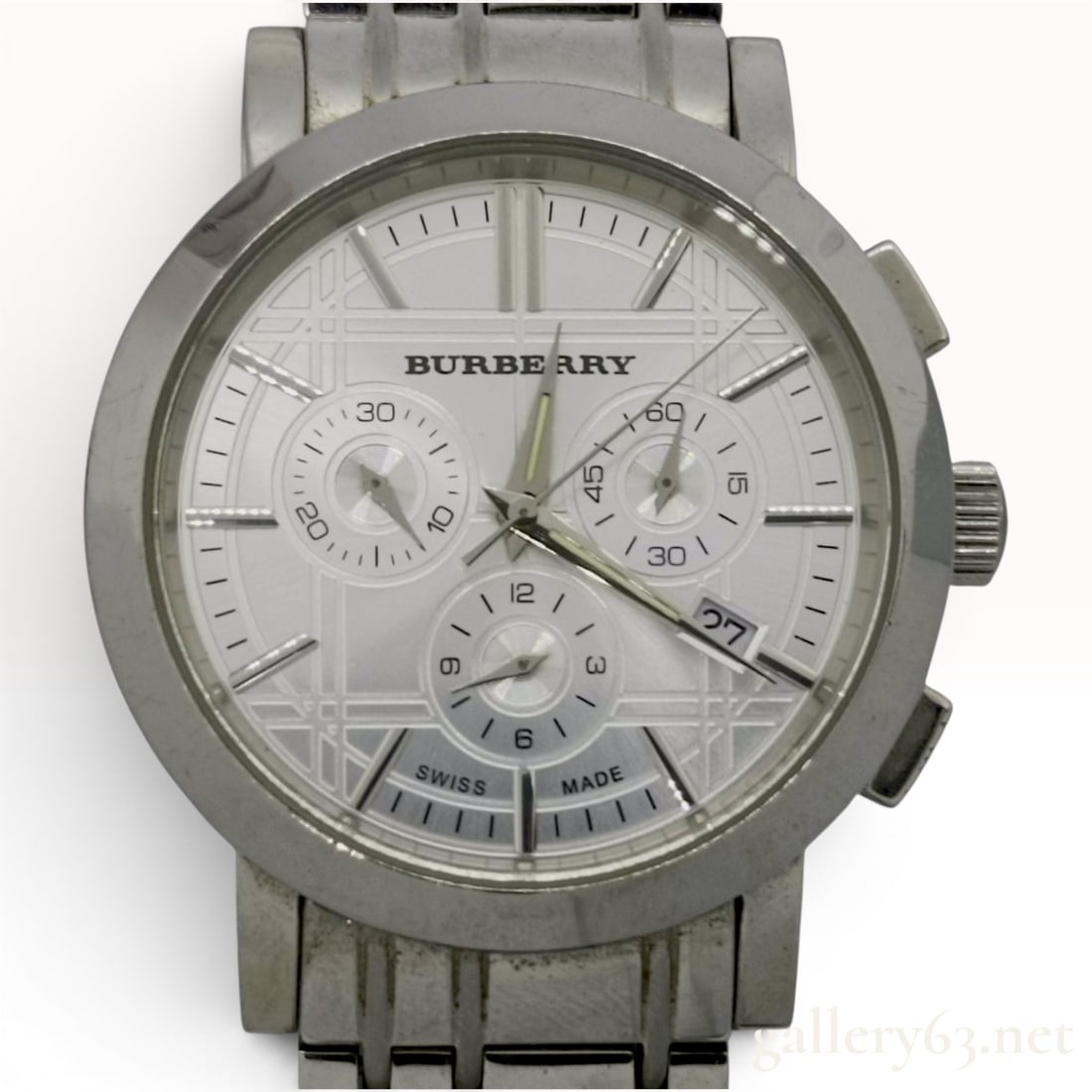 Burberry Heritage Chronograph Stainless Steel Wristwatch BU1372: A Burberry Heritage Chronograph wristwatch, reference BU1372, featuring a round stainless steel case and a polished bezel. The silver-tone dial displays the brand's signature check pattern and is equi