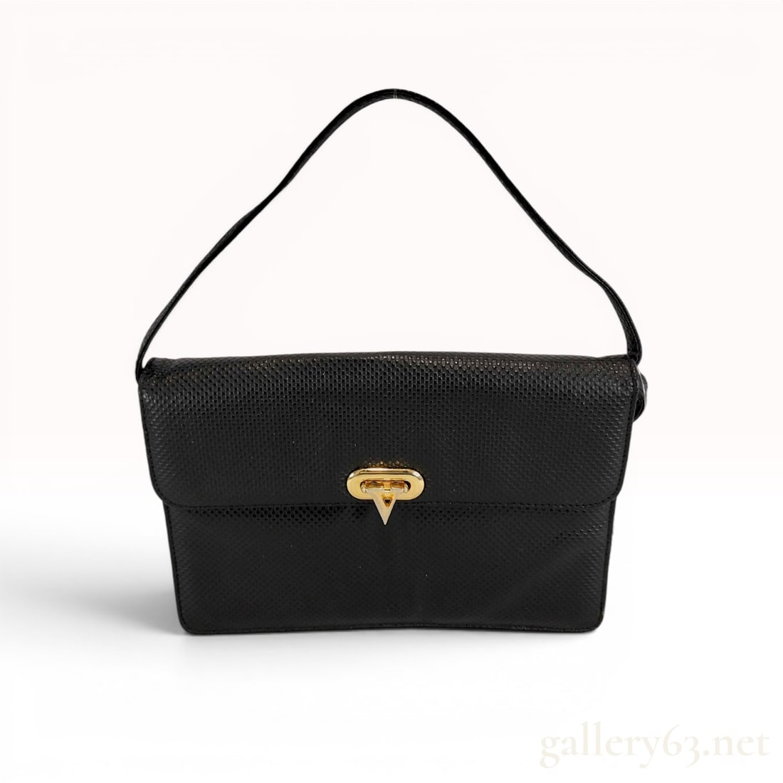 Valentino Garavani Les Sacs Vintage Black Embossed Leather Shoulder Bag: This vintage shoulder bag is a product of Valentino Garavani, belonging to the Les Sacs collection. The exterior is crafted from black leather embossed with a lizard-skin texture, featuring a structur