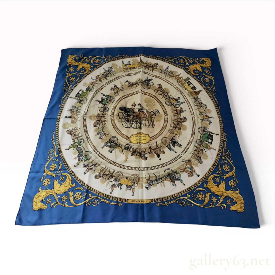 Hermes Silk Twill Scarf La Promenade de Longchamps by Philippe Ledoux: A vintage silk twill scarf featuring the La Promenade de Longchamps design by artist Philippe Ledoux for Hermes Paris. The central circular motif depicts a lady and gentleman in an open horse-drawn ca