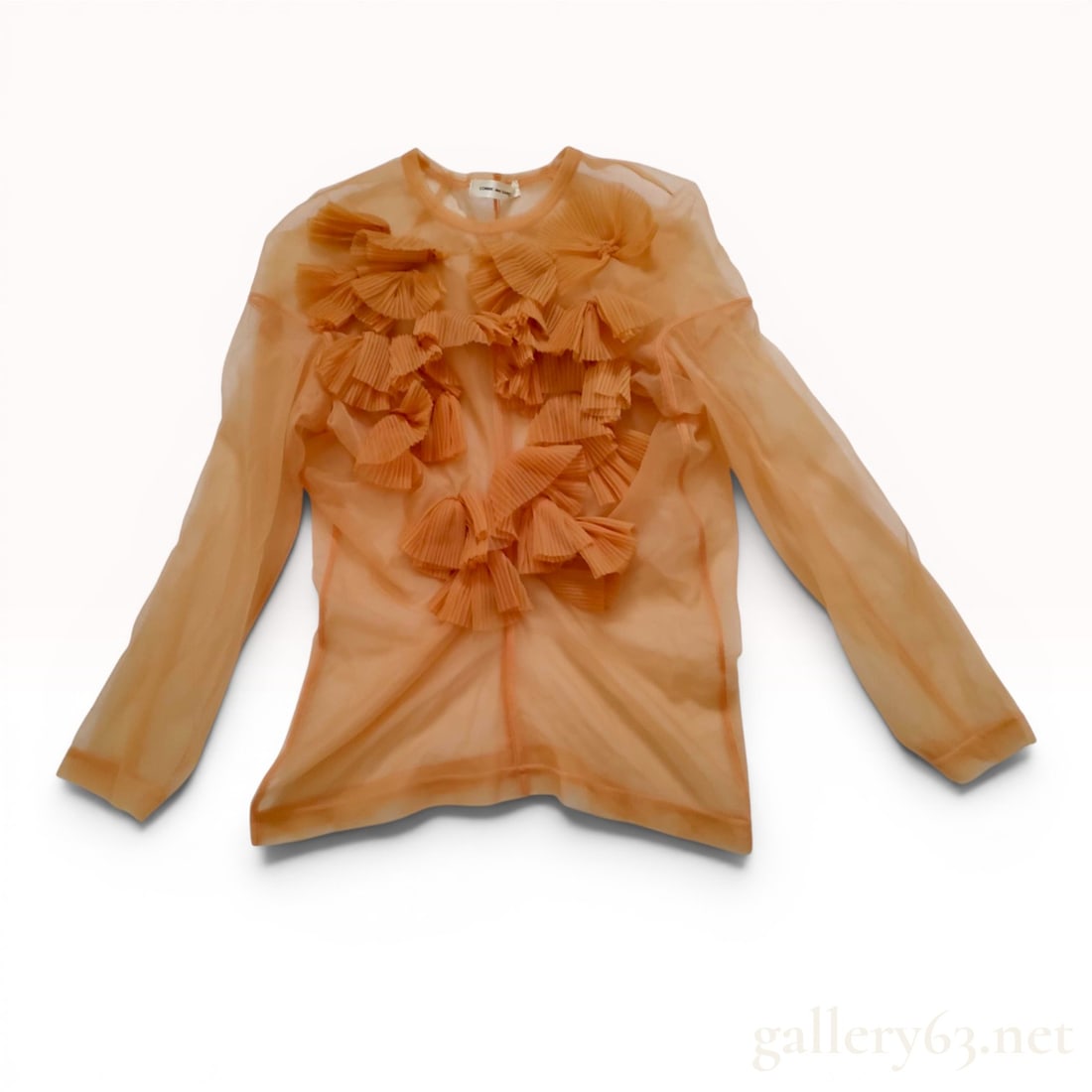 1990 AW Comme des Garcons Peach Sheer Mesh Long Sleeved Ruffle Top: A designer long sleeved top by Comme des Garcons crafted from sheer synthetic mesh in a warm peach tone. The front of the garment is heavily embellished with architectural, fan shaped accordion pleate