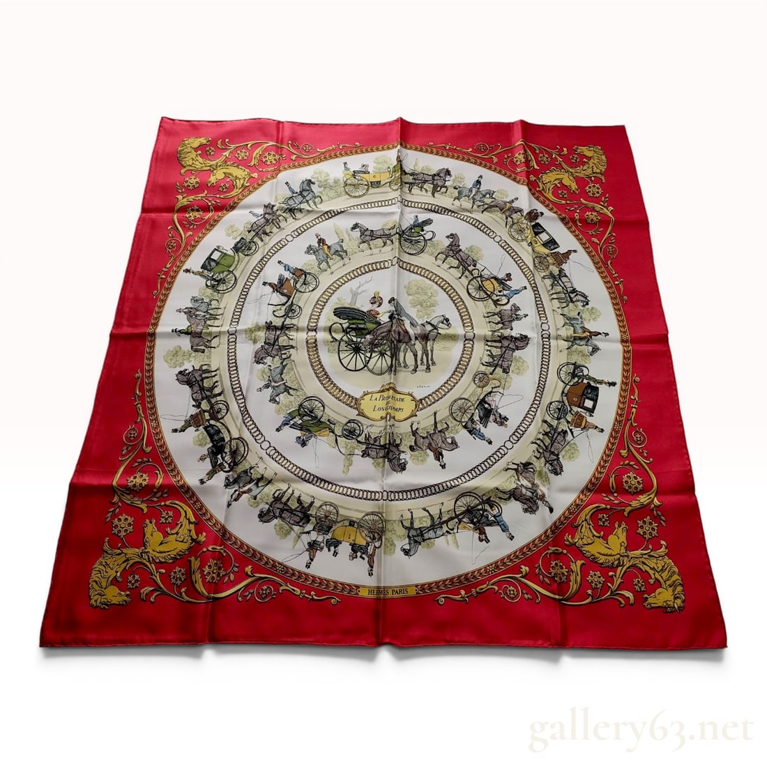 Hermes La Promenade de Longchamps Silk Scarf by Philippe Ledoux: A vintage Hermes silk twill scarf in the La Promenade de Longchamps pattern, originally designed by Philippe Ledoux in 1965. The composition features a central equestrian medallion depicting a couple 