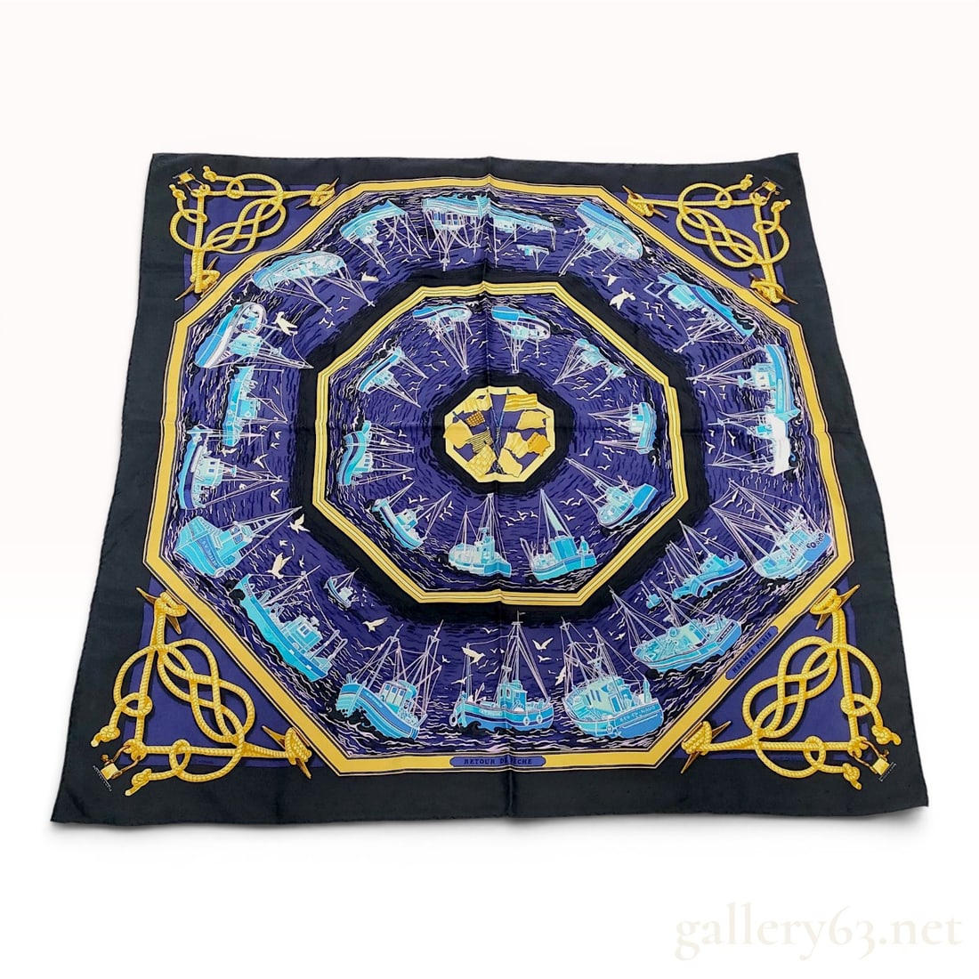 Hermes Retour de Peche Silk Carre 90: A Hermes silk twill scarf featuring the Retour de Peche (Returning from Fishing) design by artist Francoise de la Perriere. This scaf ehibits an octagonal nautical motif with concentric rings of vario