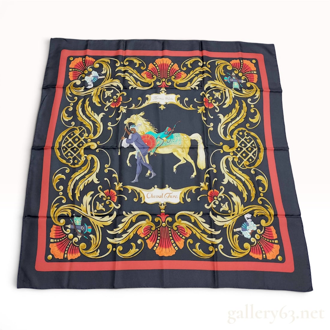 Hermes Silk Carre 90 Scarf Cheval Turc Pattern: A vintage Hermes silk carre 90 scarf featuring the Cheval Turc (Turkish Horse) pattern, a design by artist Christiane Vauzelles. The central illustration depicts a figure in traditional Ottoman-style 