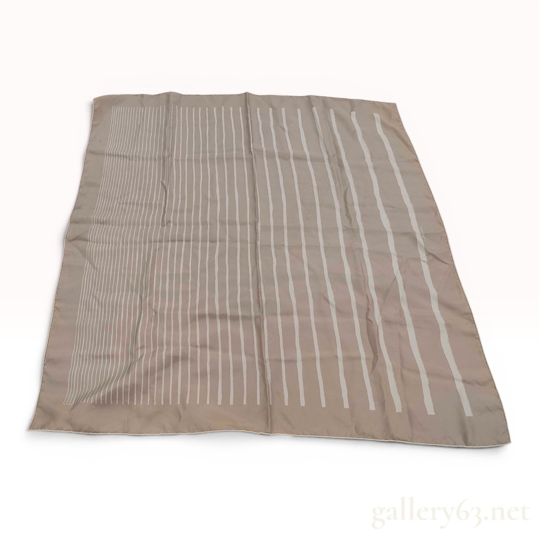 Hermes Silk Carre 90 with Modernist Stripe Design: An Hermes silk twill scarf featuring a modernist stripe design. The pattern consists of vertical white stripes of varying widths against a taupe or beige ground. The stripes have a slightly irregular,