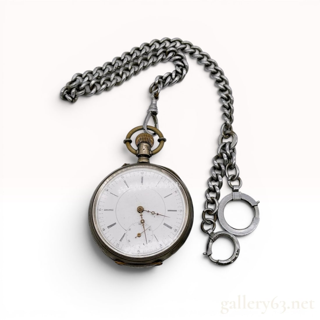 R. Schmid and Co. Antique .800 Silver Open-Face Pocket Watch with Chain: An antique open-face pocket watch manufactured by R. Schmid and Co. The timepiece features a .800 silver case with an engine-turned pattern on the back and a central circular cartouche. The white porc