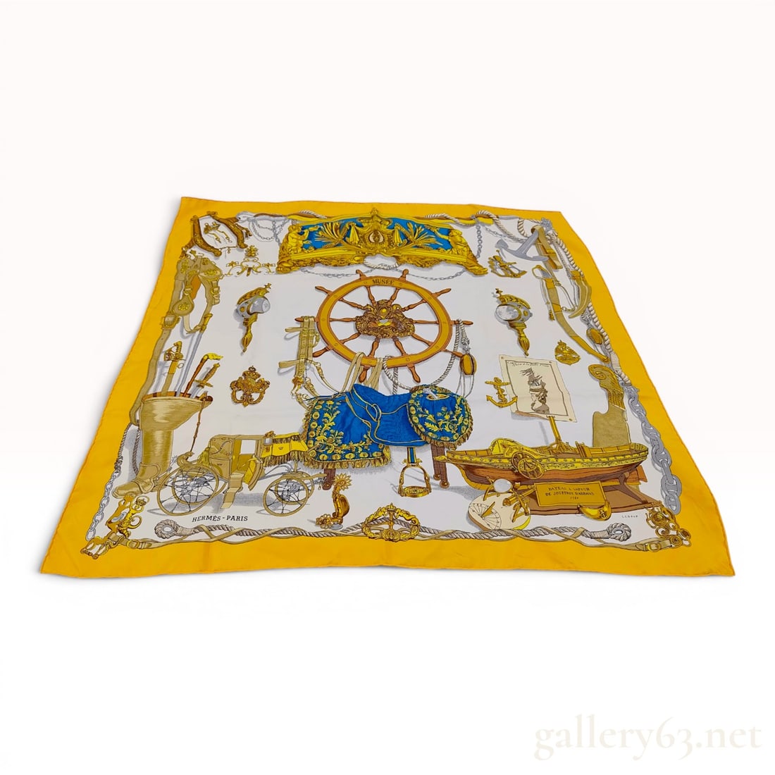 Hermes Musee Philippe Ledoux Silk Scarf in Yellow with Original Box: This Hermes silk twill scarf features the Musee pattern designed by Philippe Ledoux. The composition depicts a variety of nautical and equestrian artifacts from the Musee de la Marine in Paris. At the