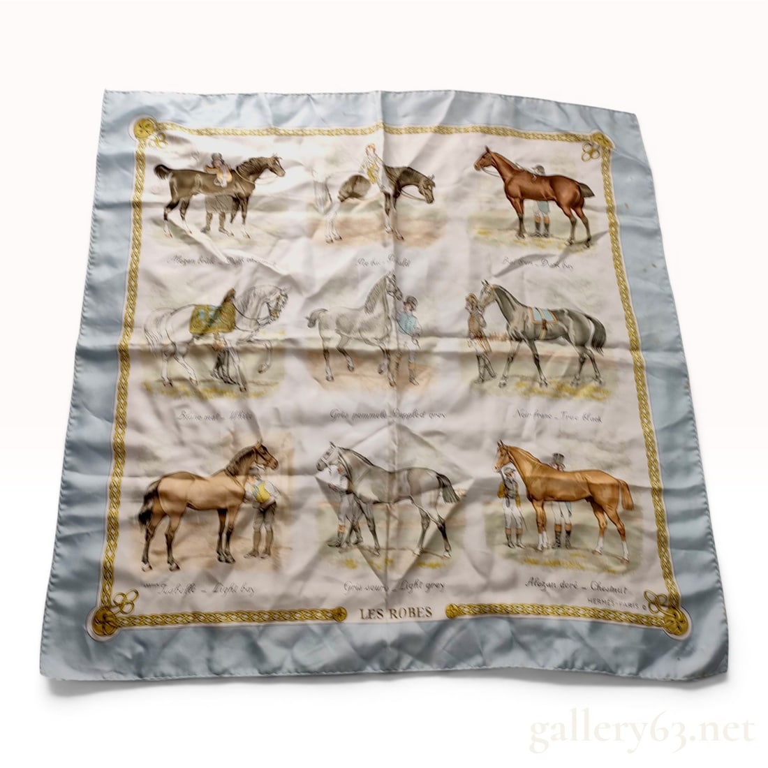 Hermes Les Robes Silk Scarf by Philippe Ledoux: Hermes silk twill scarf titled Les Robes, designed by artist Philippe Ledoux and originally issued in 1968. The design features a central cream-colored field with nine vignettes of horses illustrating