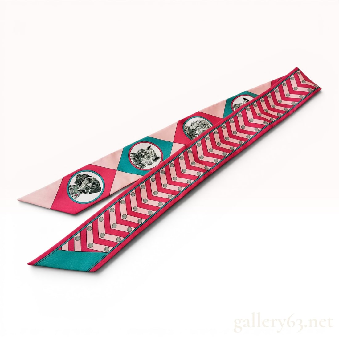 Hermes Colliers et Chiens Silk Twilly Scarf: A 100% silk twilly scarf by Hermes Paris in the Colliers et Chiens pattern. This double-sided accessory features a reversible design. One side displays finely detailed black and white canine portraits