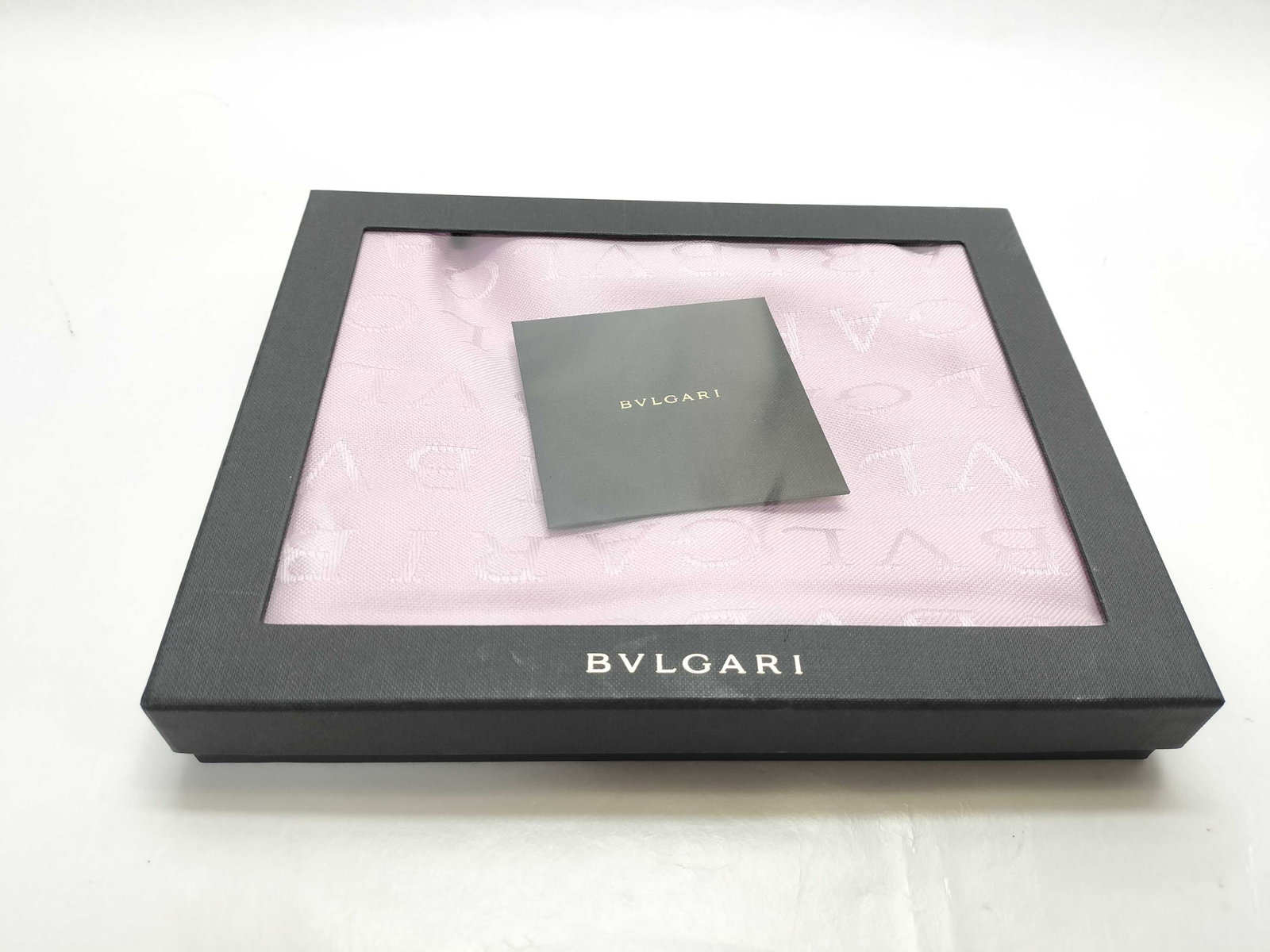 Bvlgari Silk and Wool Logo Jacquard Stole new with Box & Tags: A Bvlgari logo jacquard stole crafted from a blend of 60 percent silk and 40 percent wool in a pale lavender-pink color. The textile features an allover tone-on-tone jacquard-woven Bvlgari brand logo 