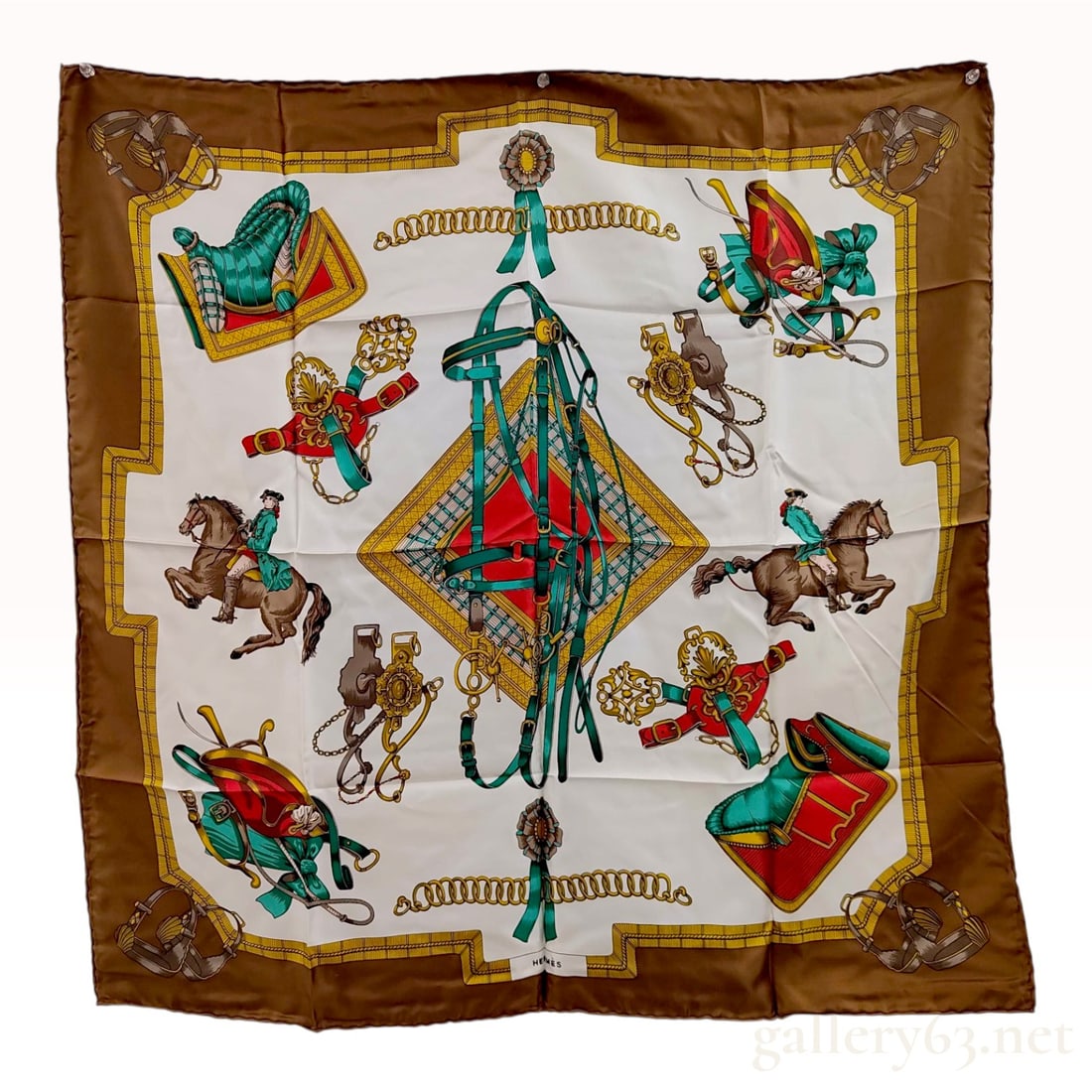 Hermes Silk Scarf Grand Apparat Pattern: This is a 100 percent silk twill scarf from Hermes featuring the Grand Apparat design, originally created by artist Jacques Eudel in 1962. The design centers on an elaborate teal-green bridle displaye