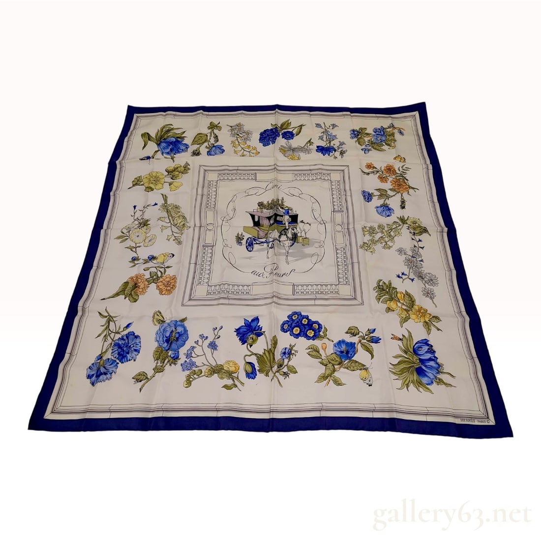 Hermes Quai aux Fleurs Silk Twill Carre 90 Scarf: A vintage Hermes silk twill square scarf featuring the Quai aux Fleurs motif designed by Niki Goulandris. The central design depicts a horse-drawn florist carriage within an ornate cartouche. The ivor