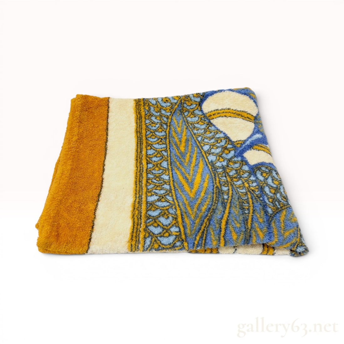 Vintage Hermes Paris Printed Cotton Terry Cloth Beach Towel: Hermes Paris beach towel crafted from 100 percent cotton terry cloth. The textile features a central stylized abstract motif rendered in shades of blue and golden yellow set against a cream-colored gr