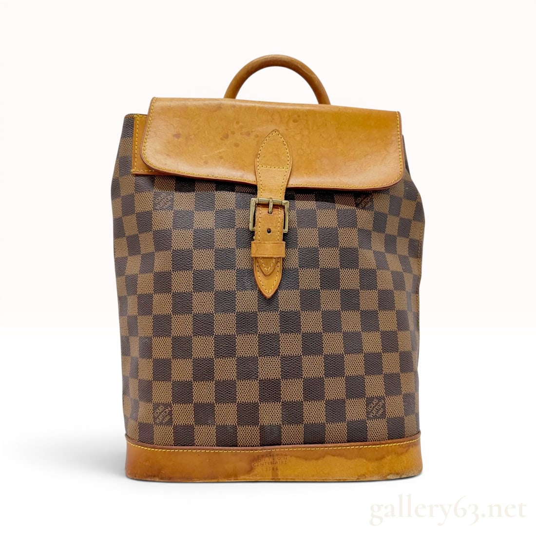 Louis Vuitton Damier Ebene Limited Edition Centennial Soho Backpack: Louis Vuitton limited edition Soho backpack from the 1996 Centennial Collection, released to celebrate the 100th anniversary of the Monogram canvas. This piece is crafted from Damier Ebene coated canv