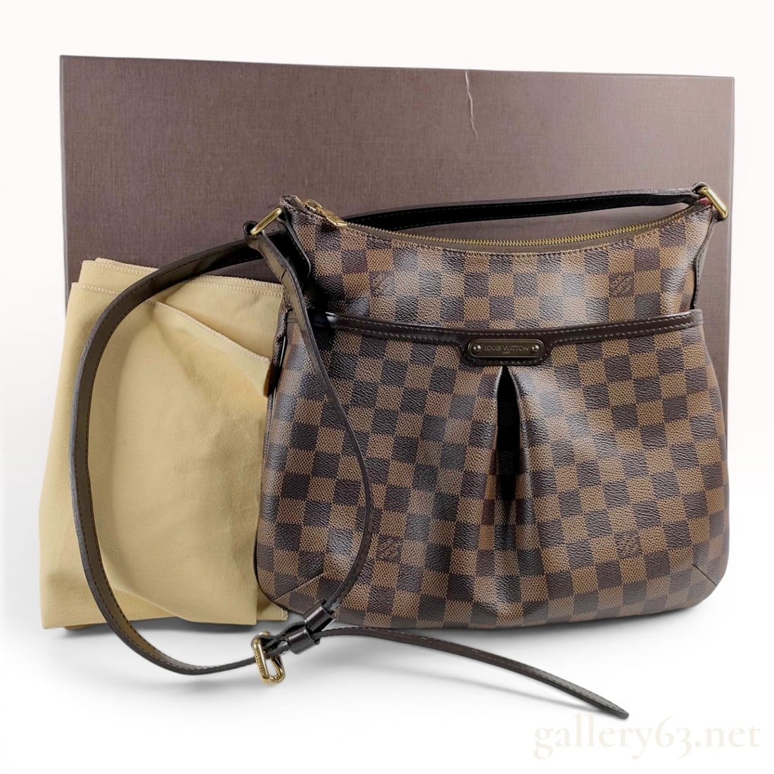 Louis Vuitton Damier Ebene Bloomsbury PM Crossbody Bag with Box: A Louis Vuitton Bloomsbury PM crossbody messenger bag featuring the signature Damier Ebene checkered coated canvas. The bag is constructed with a pleated front face accented by dark brown cowhide leat