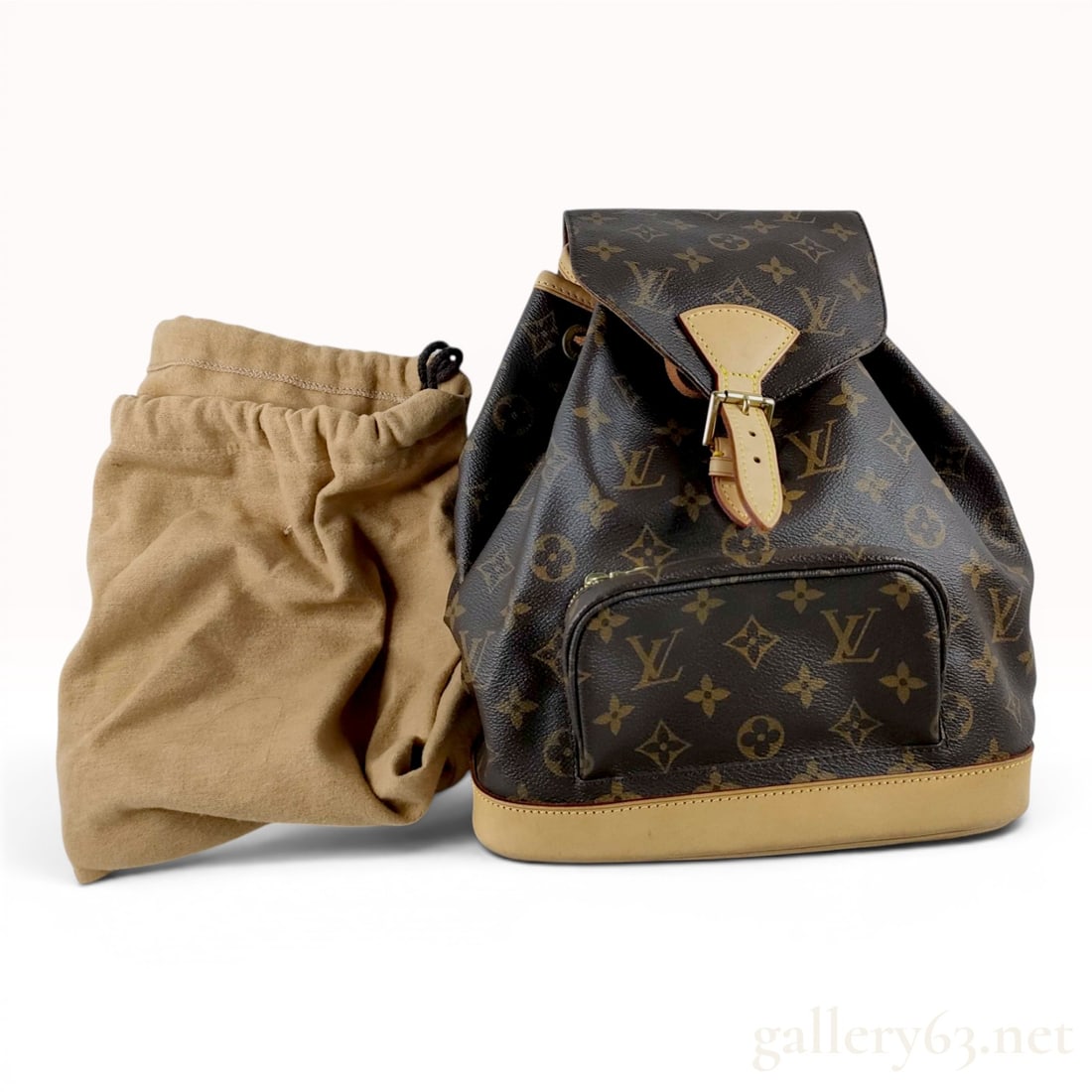 Louis Vuitton Monogram Canvas Montsouris PM Backpack with Dust Bag: A Louis Vuitton Montsouris PM backpack constructed from signature monogram coated canvas with natural Vachetta leather trim and a reinforced leather base. The exterior features a single zippered front