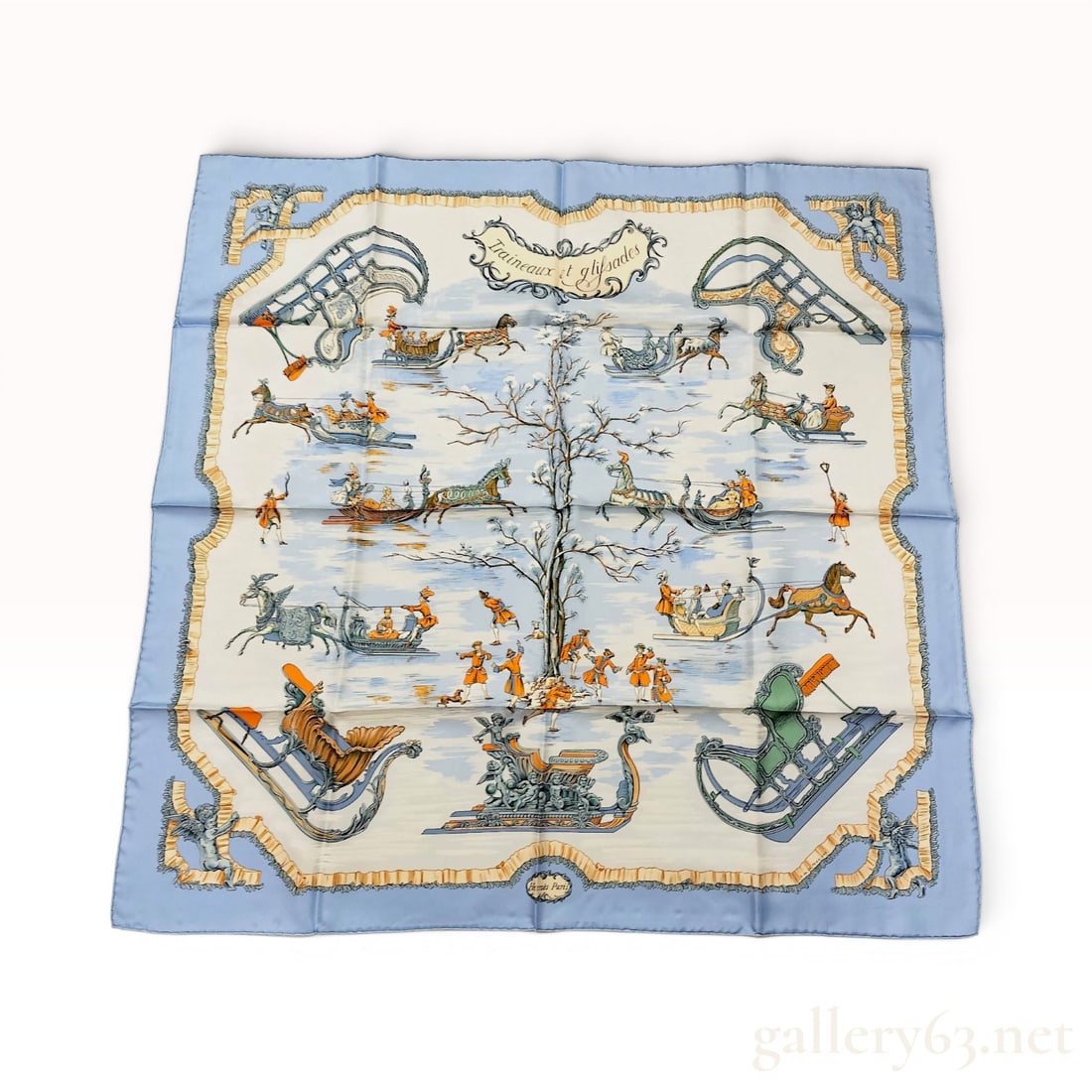 Hermes Traineaux et Glissades Silk Scarf Designed by Francoise de la Perriere: An Hermes 100 percent silk Carre 90 scarf in the Traineaux et glifsades pattern, originally designed by artist Francoise de la Perriere. The composition depicts an 18th-century winter scene with figur