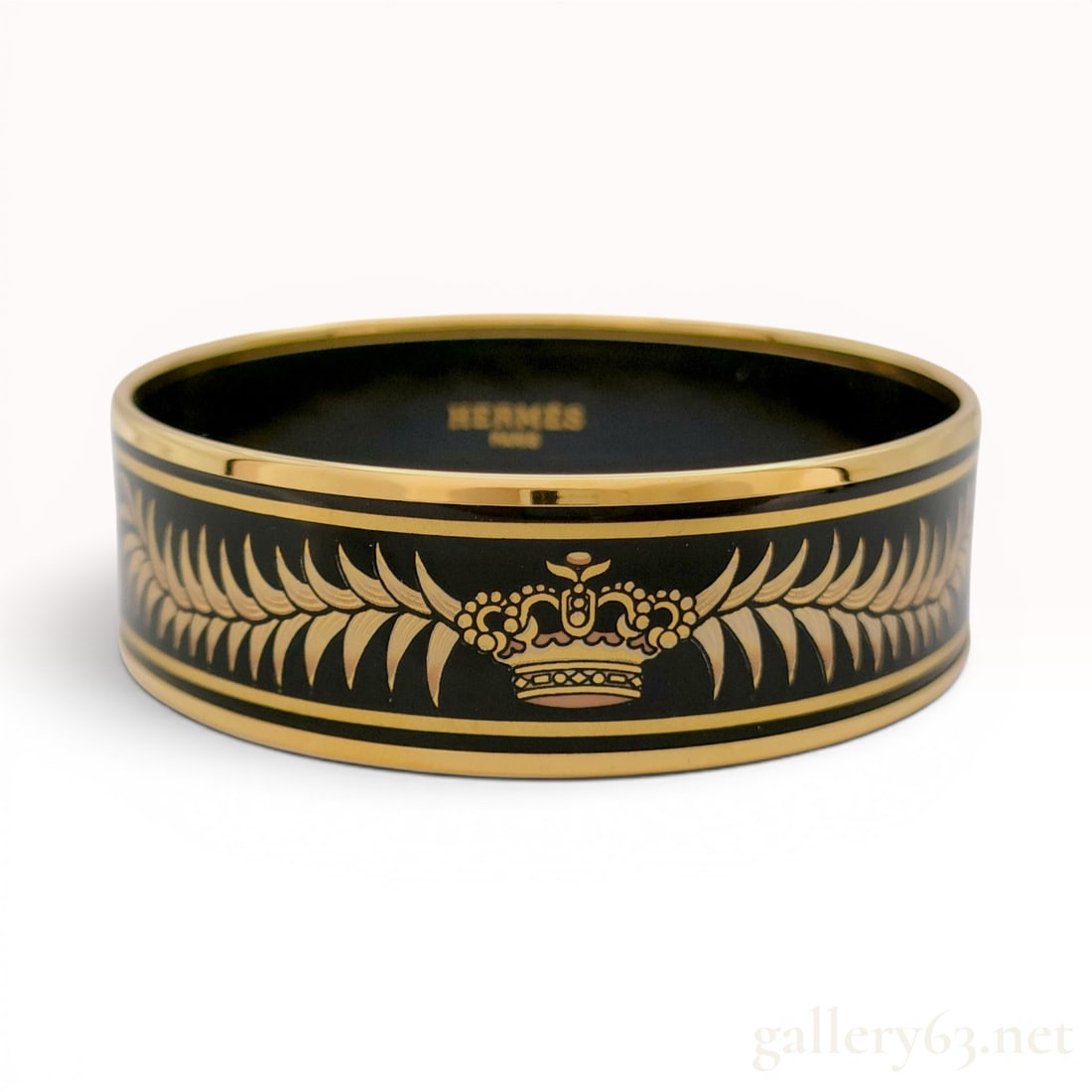 Hermes Tyger Tyger Enamel Wide Bangle Bracelet with Box: This wide enamel bangle bracelet from Hermes features the Tyger Tyger motif, a design by artist Alice Shirley. The exterior is finished in black enamel with gold-tone plated metal trim. The design dis