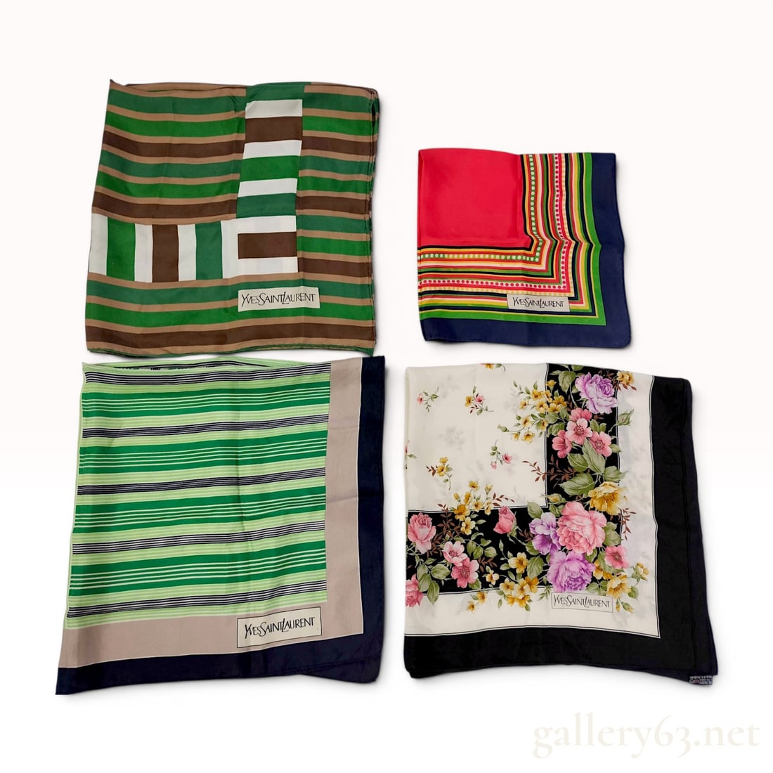 A Group of Four Yves Saint Laurent Silk Scarves: This collection consists of four designer silk scarves produced by Yves Saint Laurent, dating approximately to the 1970s and 1980s. Each scarf is constructed of silk twill and features hand-rolled, ha