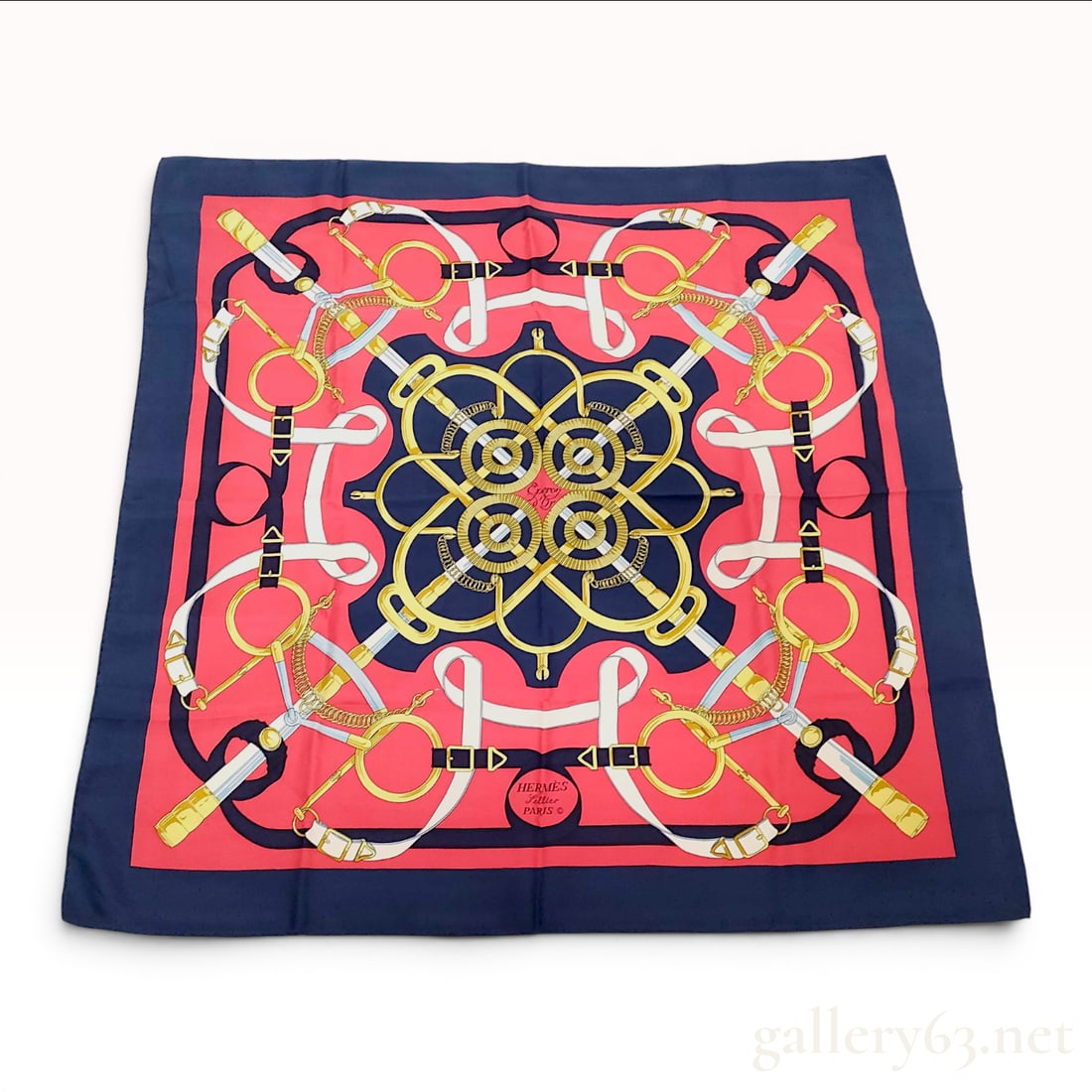 Hermes Eperon d Or Silk Gavroche Carre 90: Hermes carre 90 features the Eperon d Or (Golden Spur) pattern designed by Henri d Origny. The equestrian-themed motif includes a complex arrangement of bits, bridles, and spurs. The colorway is compo
