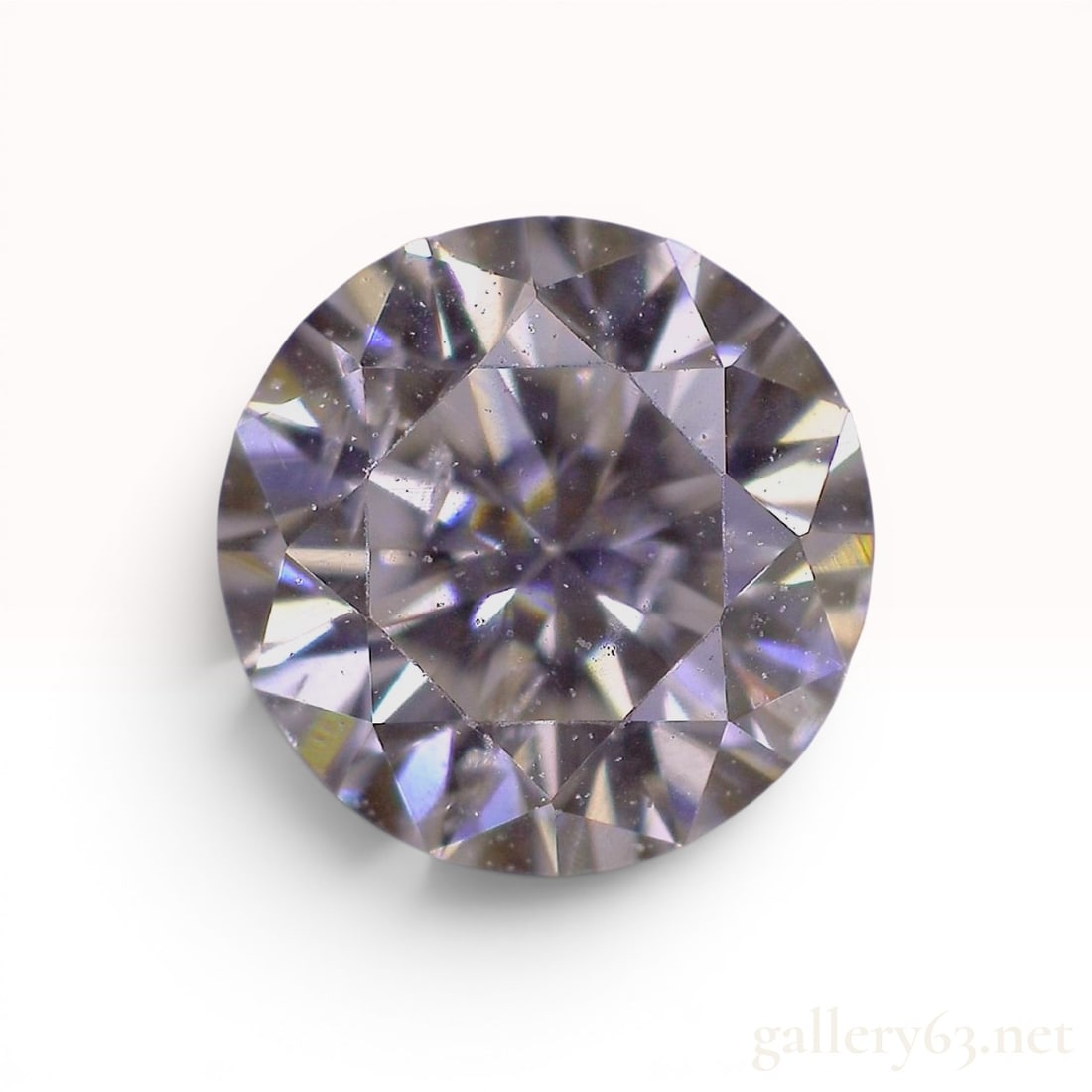 Natural Round Brilliant Cut Diamond, 0.209 Carat, K Color, SI-2 Clarity, CGL Certified: This lot features a loose natural diamond with a round brilliant cut. The stone is accompanied by a grading certificate from the Central Gem Laboratory (CGL) of Japan, report number O2233991. Accordin
