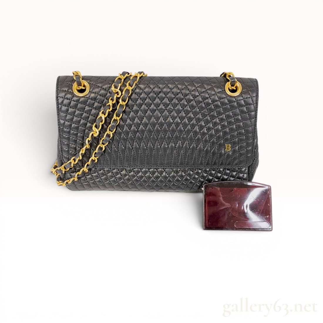 Bally Vintage Black Quilted Leather Double Flap Chain Shoulder Bag: A vintage Bally shoulder bag constructed from black diamond-quilted leather with gold-tone hardware. The exterior features a front flap with a magnetic snap closure and a small gold-tone B logo on the