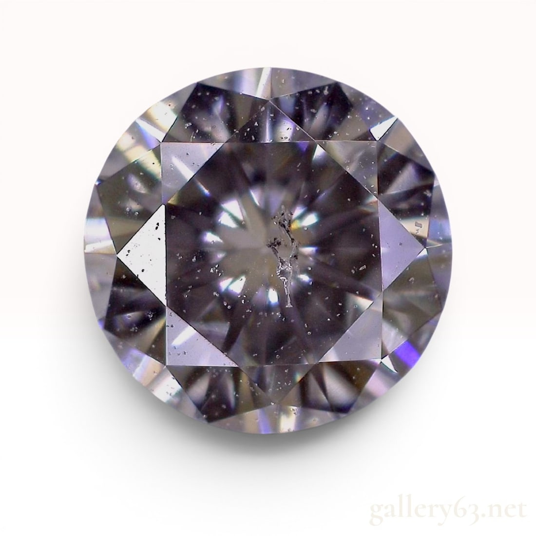 Round Brilliant Cut Natural Diamond, 0.201 ct, CGL Certified: This loose round brilliant cut natural diamond is accompanied by a grading report from the Central Gem Laboratory (CGL), report number O2211410, dated January 12, 2022. The diamond is graded with K co