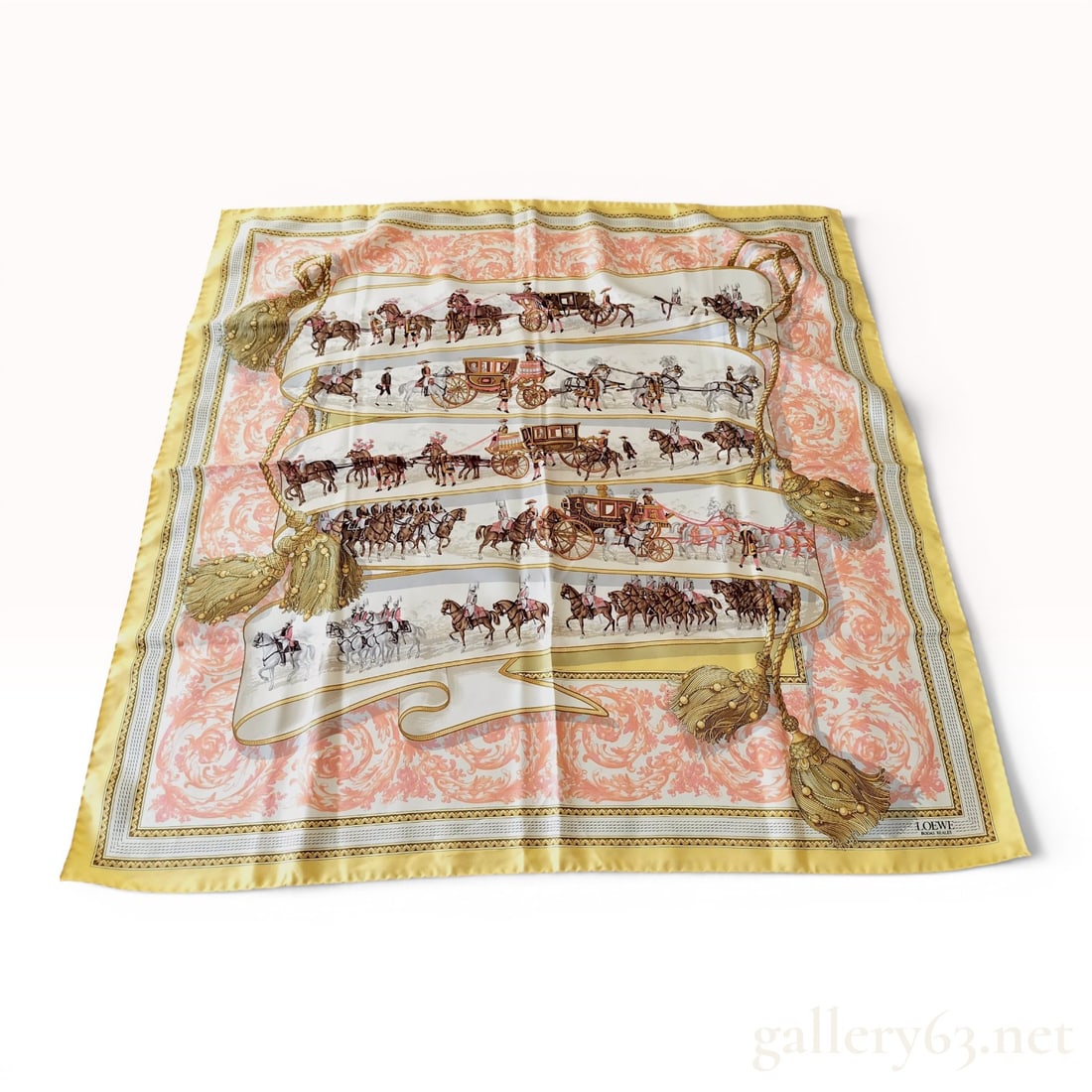 Loewe Bodas Reales Square Silk Scarf: This square silk scarf is produced by the Spanish luxury brand Loewe and features the Bodas Reales (Royal Weddings) pattern. The central design depicts a multi-tiered horizontal procession of royal ho
