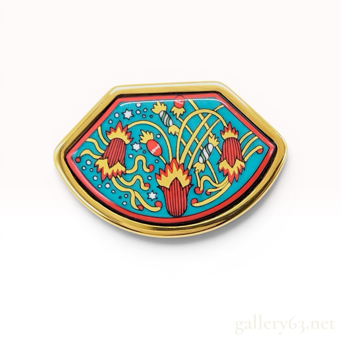 Vintage Hermes Fan-Shaped Enamel Brooch with Botanical Motif and Original Box: Hermes enamel brooch featuring a fan-shaped silhouette. The decorative surface displays a stylized botanical motif with red and yellow floral blooms, green and white striped buds, and white stars and 