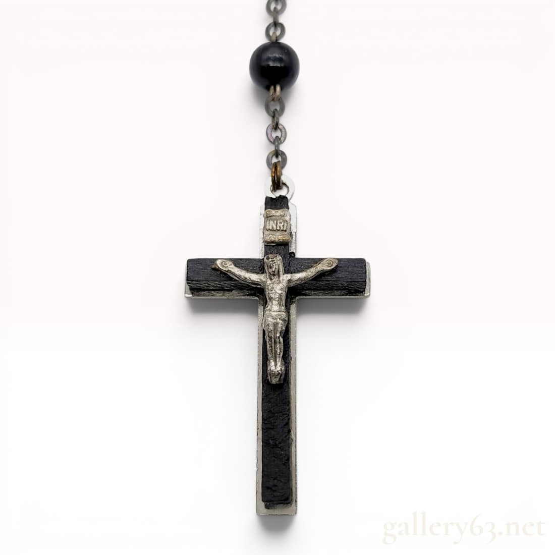 Dolce & Gabbana Black Bead Rosary Necklace with Box: This Dolce & Gabbana rosary-style necklace is composed of spherical black beads, appearing to be painted wood or composite, joined by a silver-tone metal chain. The necklace features a crucifix pendan