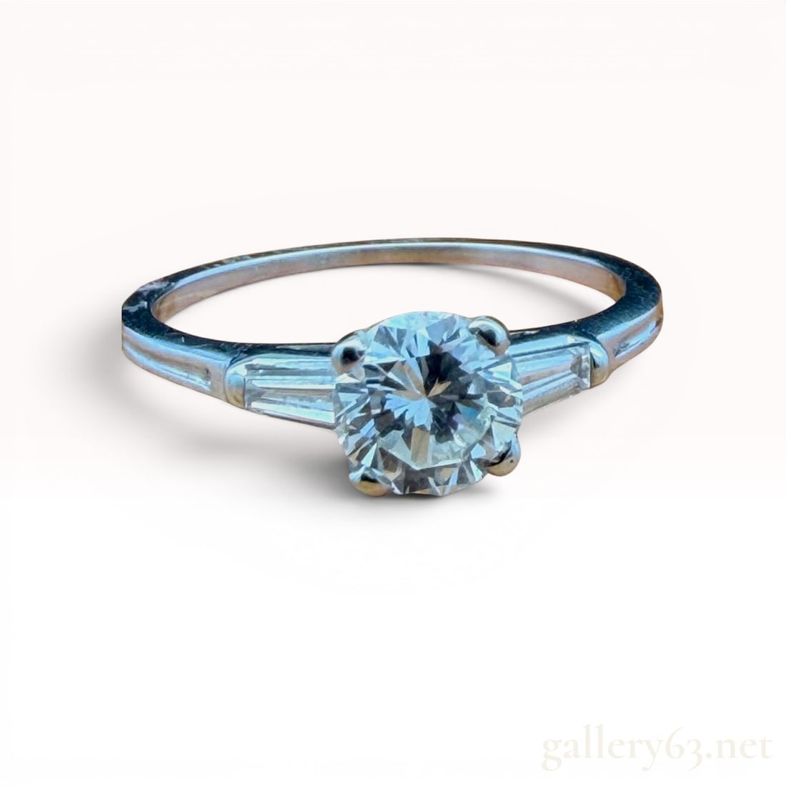 Tiffany Platinum Diamond Ring: Features a 0.65 carat center stone. Size 6 and weighs 2.3 grams. 2.3 grams