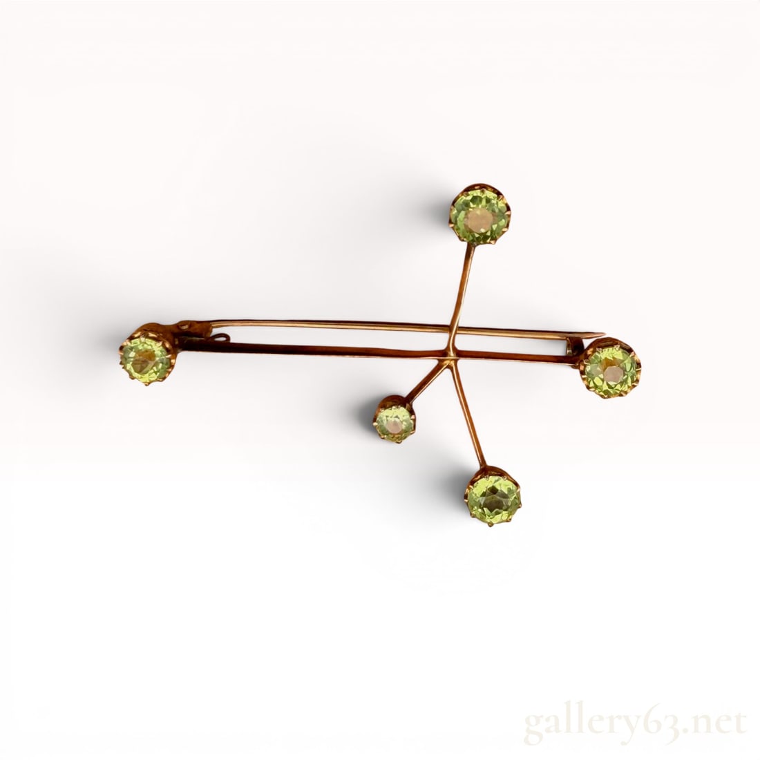 10K Yellow Gold Peridot Brooch: Features 1.10cttw of peridot and weighs 3.2 grams. 3.2 grams