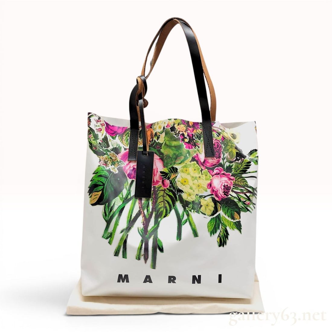 Marni Tribeca Floral Print PVC Shopper Tote Bag: This Marni Tribeca N/S shopper tote bag is constructed from a white coated PVC fabric featuring a vibrant multicolor floral bouquet print on the front. The bag has an open-top design and an unlined in