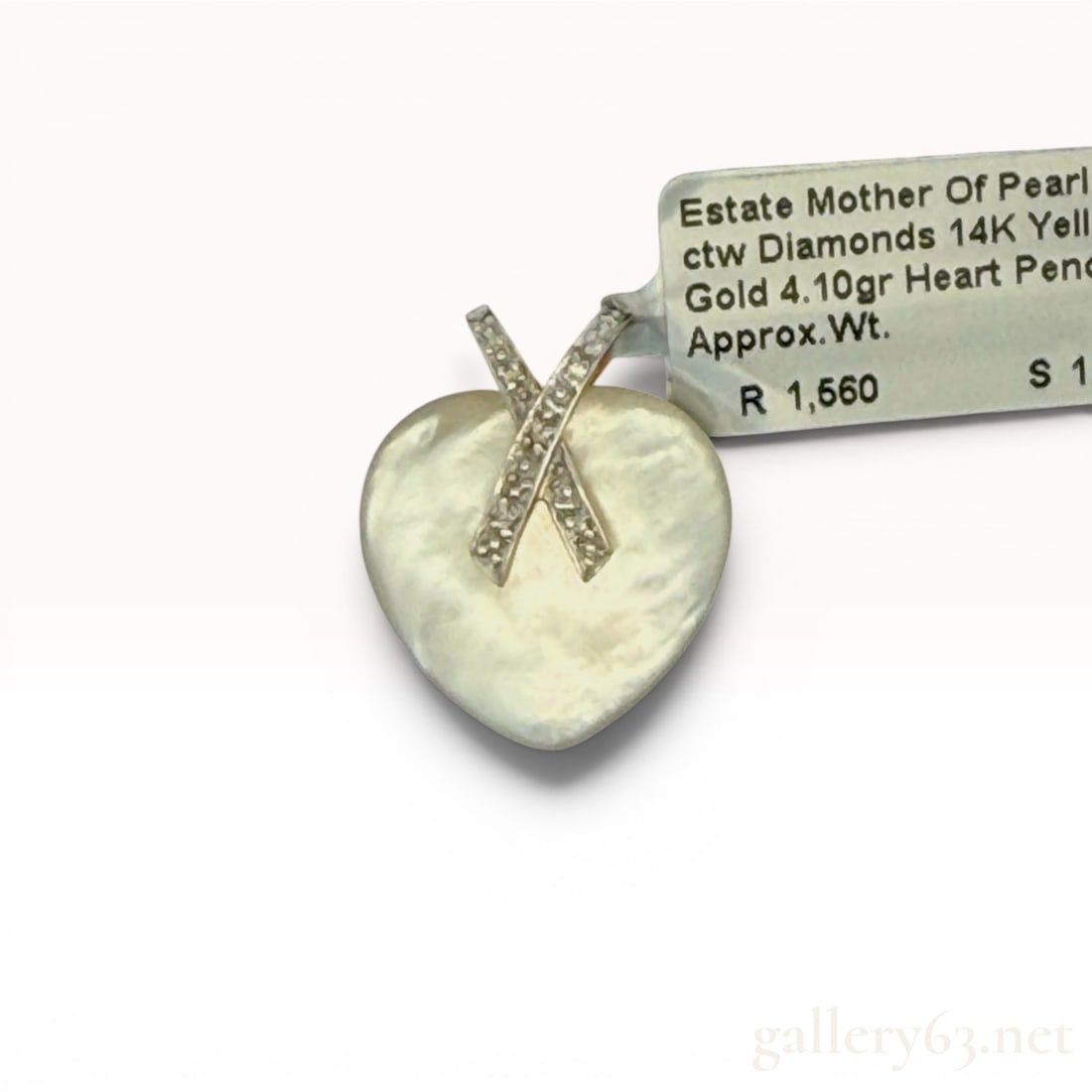 14K Gold Mother-of-Pearl and Diamond Pendant: Weighs 4.1 grams and features 0.05 carat of diamonds. 4.1 grams
