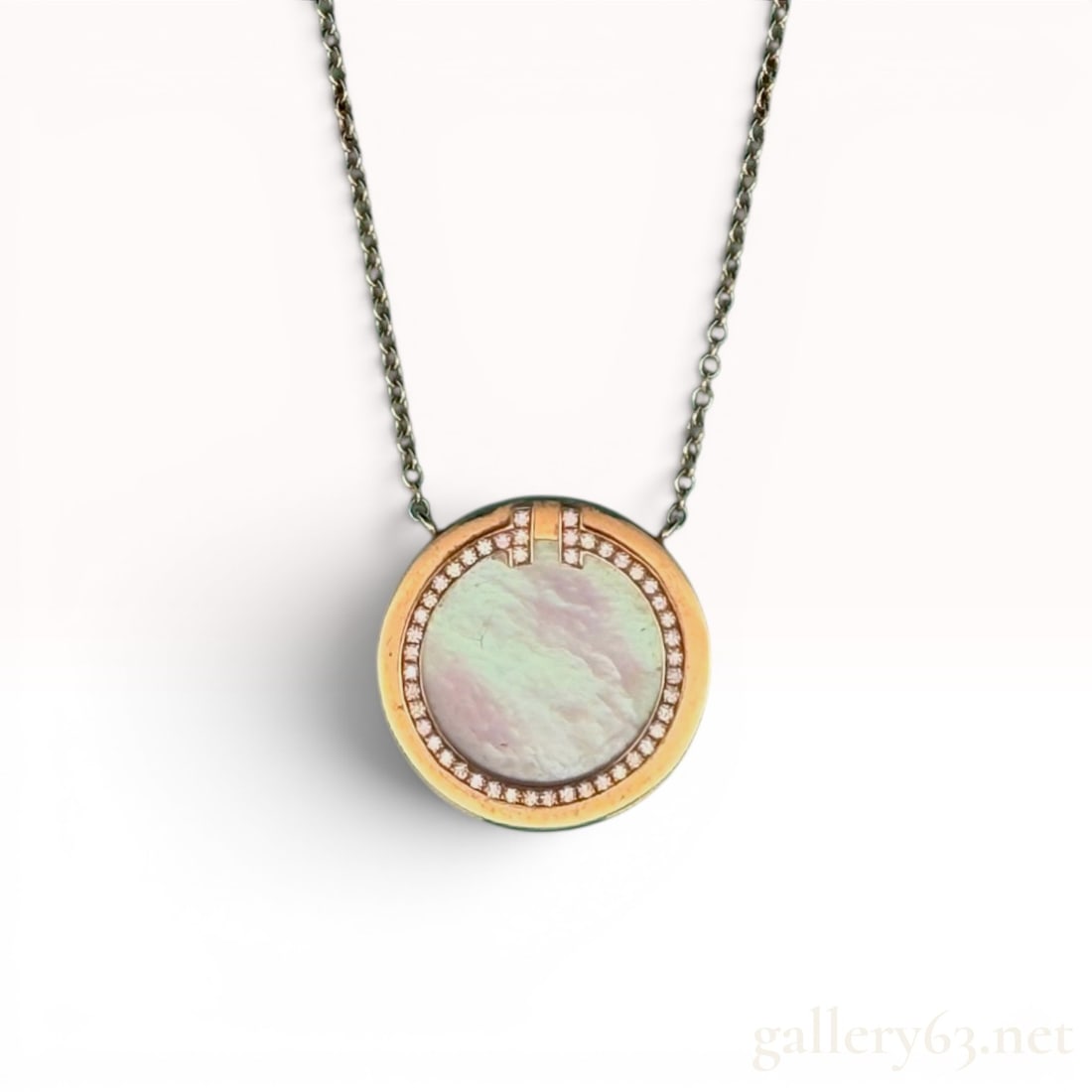 Tiffany 18K Diamond Mother-of-Pearl Necklace: Features 0.10cttw of diamonds, weighs 4.5 grams, and has an adjustable length. 4.5 grams