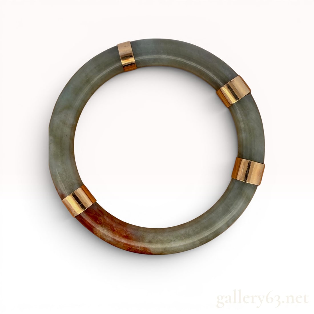 14K Gold Jadeite Jade Bangle: In good condition and weighs 52.7 grams. 52.7 grams