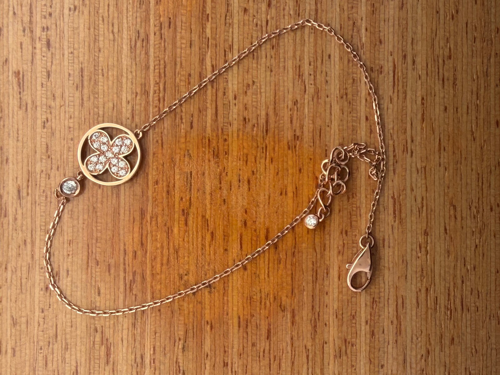 14K Rose Gold Bracelet: Adjustable length, CZ stones and 1.6 grams 1.6 grams
