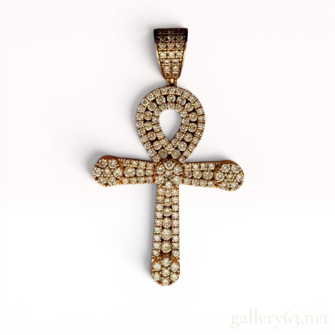 10K Yellow Gold Diamond Cross: Weighs 9.5 grams and features 2.93 carats of natural diamonds. 9.5 grams