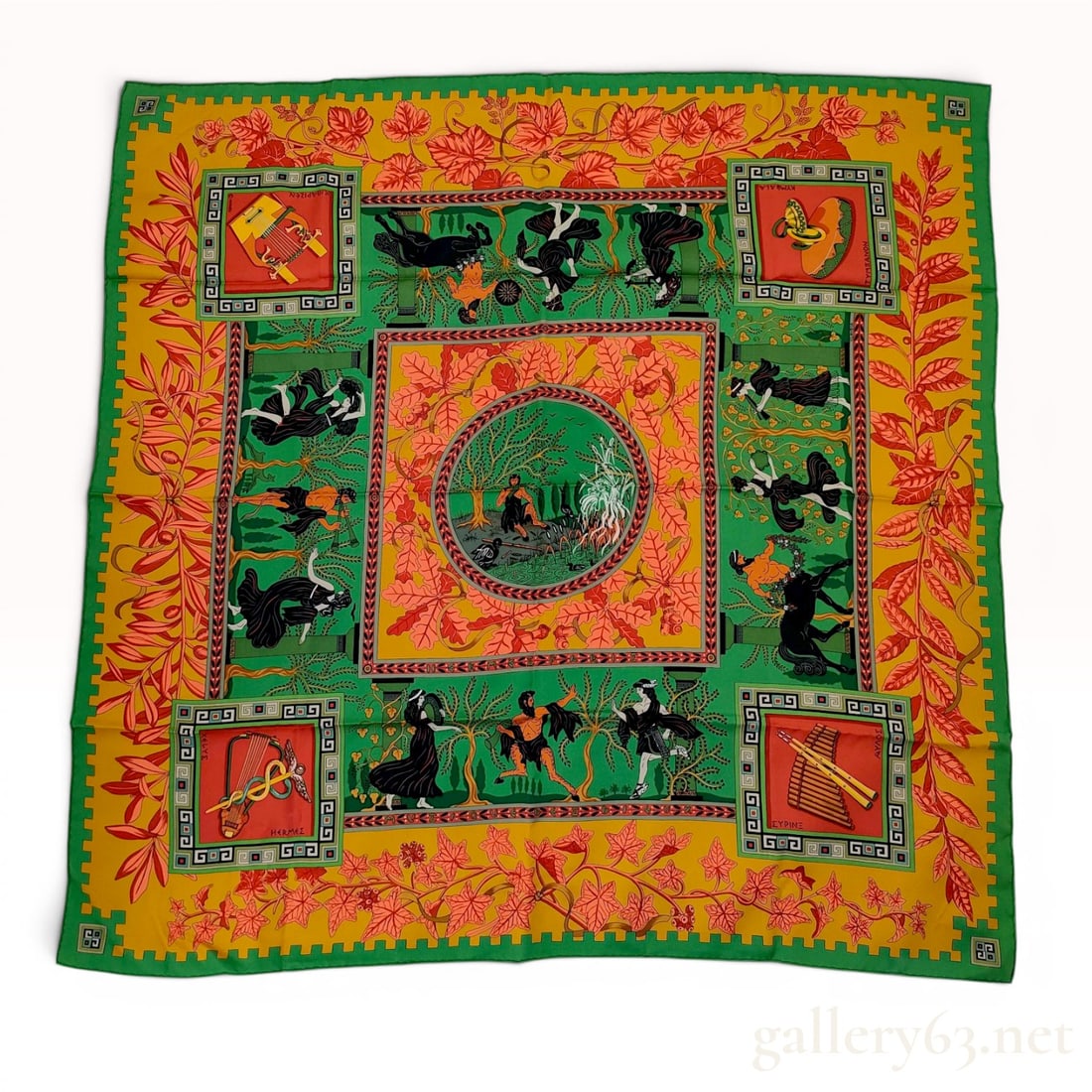 Hermes Musique des Dieux Silk Scarf by Claudia May: An authentic Hermes silk square scarf titled Musique des Dieux (Music of the Gods), designed by artist Claudia May. The central circular medallion depicts the deity Pan playing panpipes in a pastoral