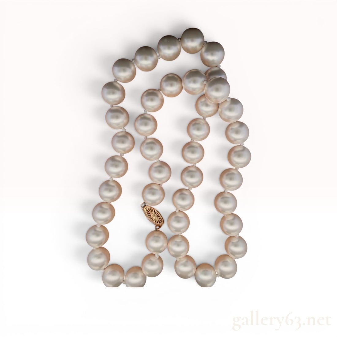 14K Yellow Gold 10mm Pearl Necklace: Features 10mm pearls, weighs 68.7 grams, and measures 19" long. 68.7 grams