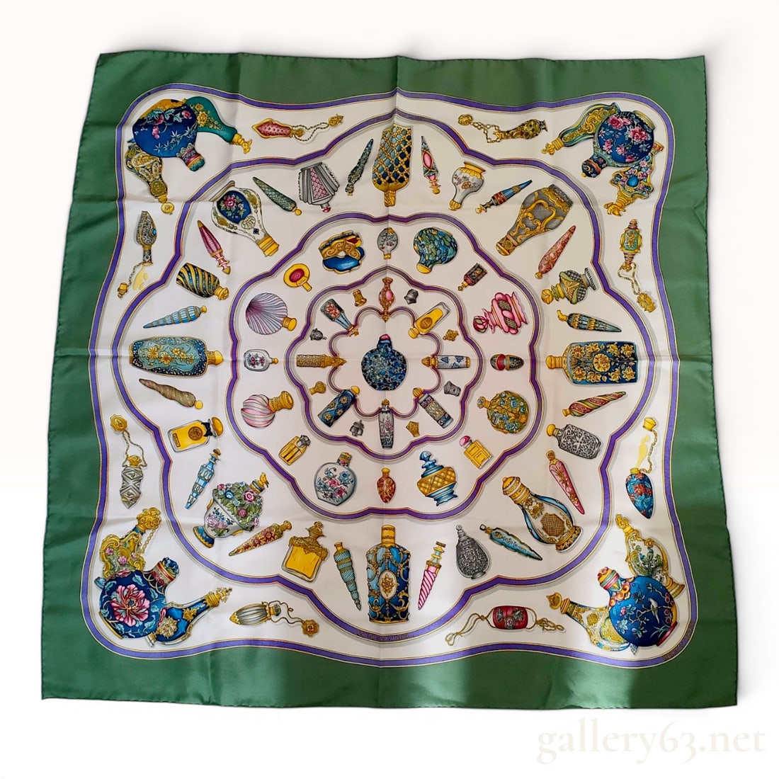 Hermes Qu'importe le flacon Silk Twill Scarf: A square silk twill scarf produced by Hermes, featuring the Qu'importe le flacon... pattern designed by Catherine Baschet. First issued in 1988, the design depicts a diverse collection of ornate and a