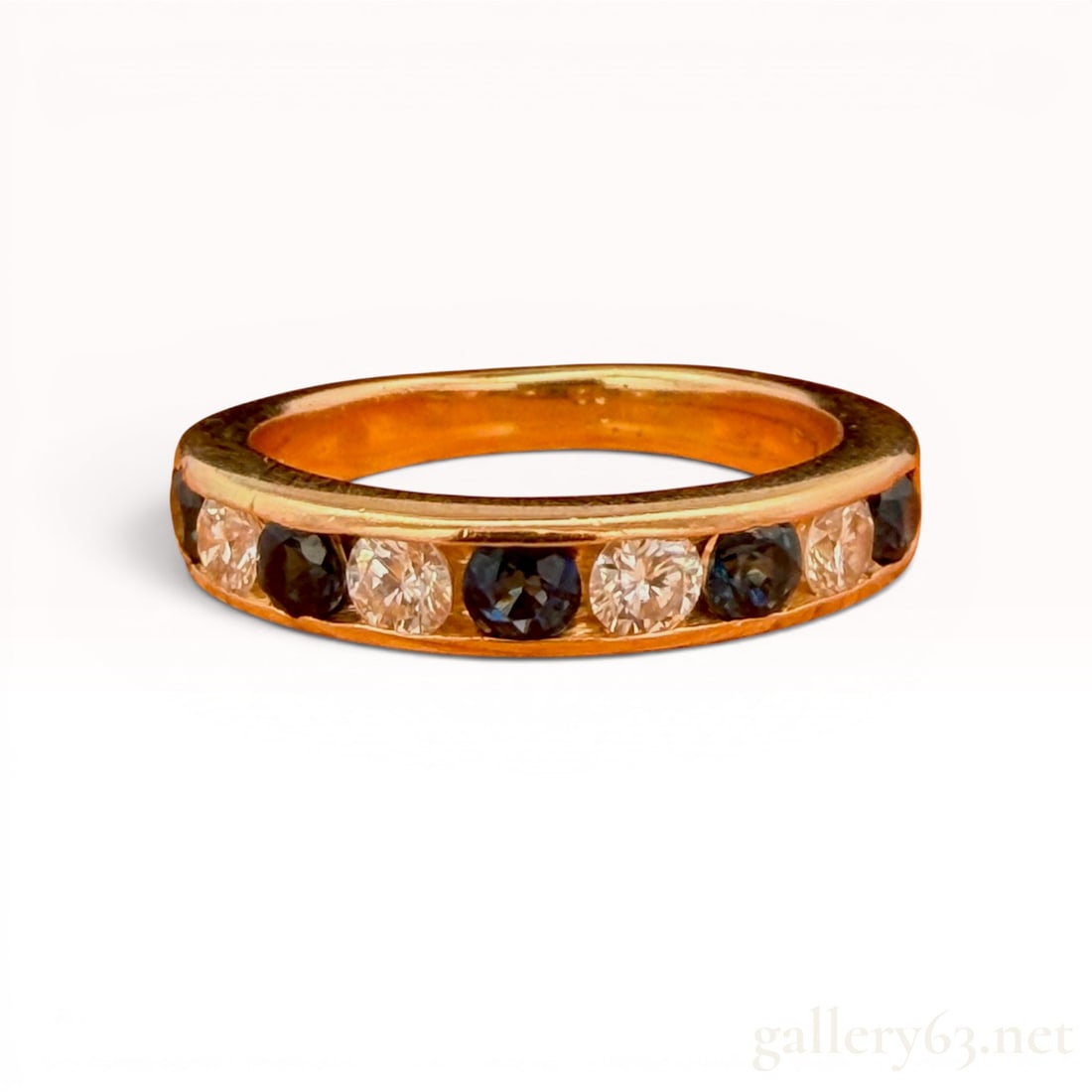 18K Gold Diamond and Sapphire Ring: Size 6, weighs 4.8 grams, and features 0.90cttw of stones. 4.8 grams