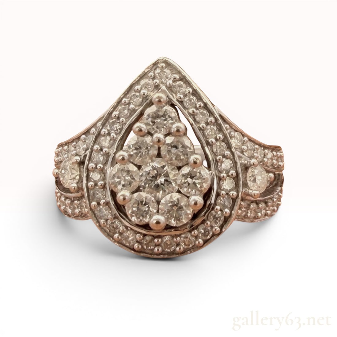 14K White Gold Diamond Ring: Features 0.60cttw of diamonds. Size 5 and weighs 6.2 grams. 6.2 grams
