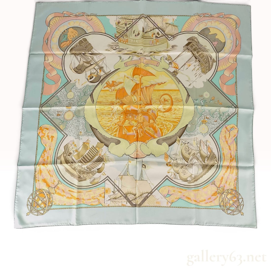 Hermes Au-dela des cinq Mers Silk Scarf: An Hermes silk twill scarf in the Au-dela des cinq Mers (Beyond the Five Seas) pattern. The design features a nautical and maritime exploration theme centered on a circular vignette depicting a naviga