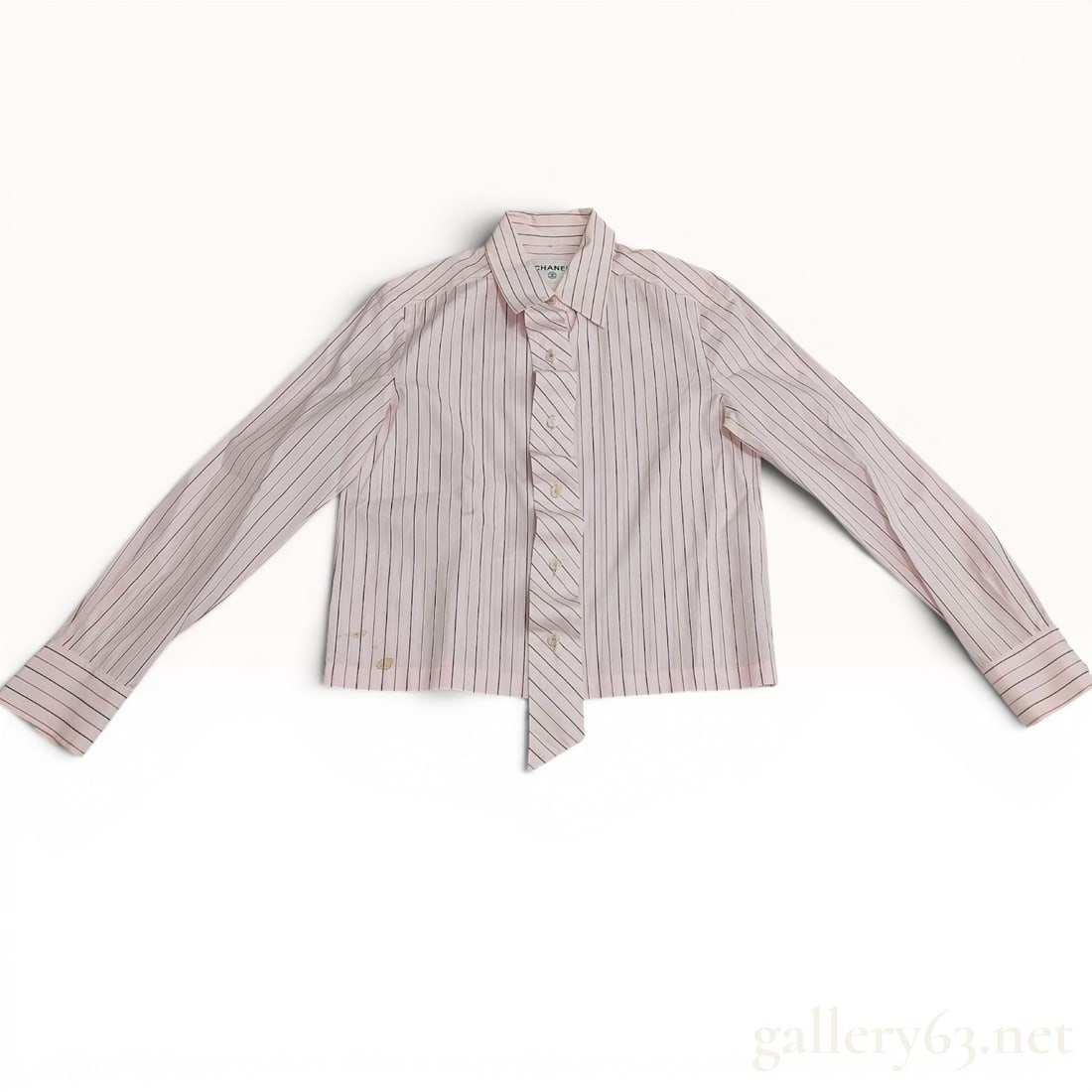 Chanel Striped Cotton Cropped Tie-Front Shirt: A Chanel long-sleeve button-down shirt featuring a vertical stripe pattern in dark brown, tan, and blue on a light pink ground. The garment is constructed from 100% cotton and designed with a cropped 