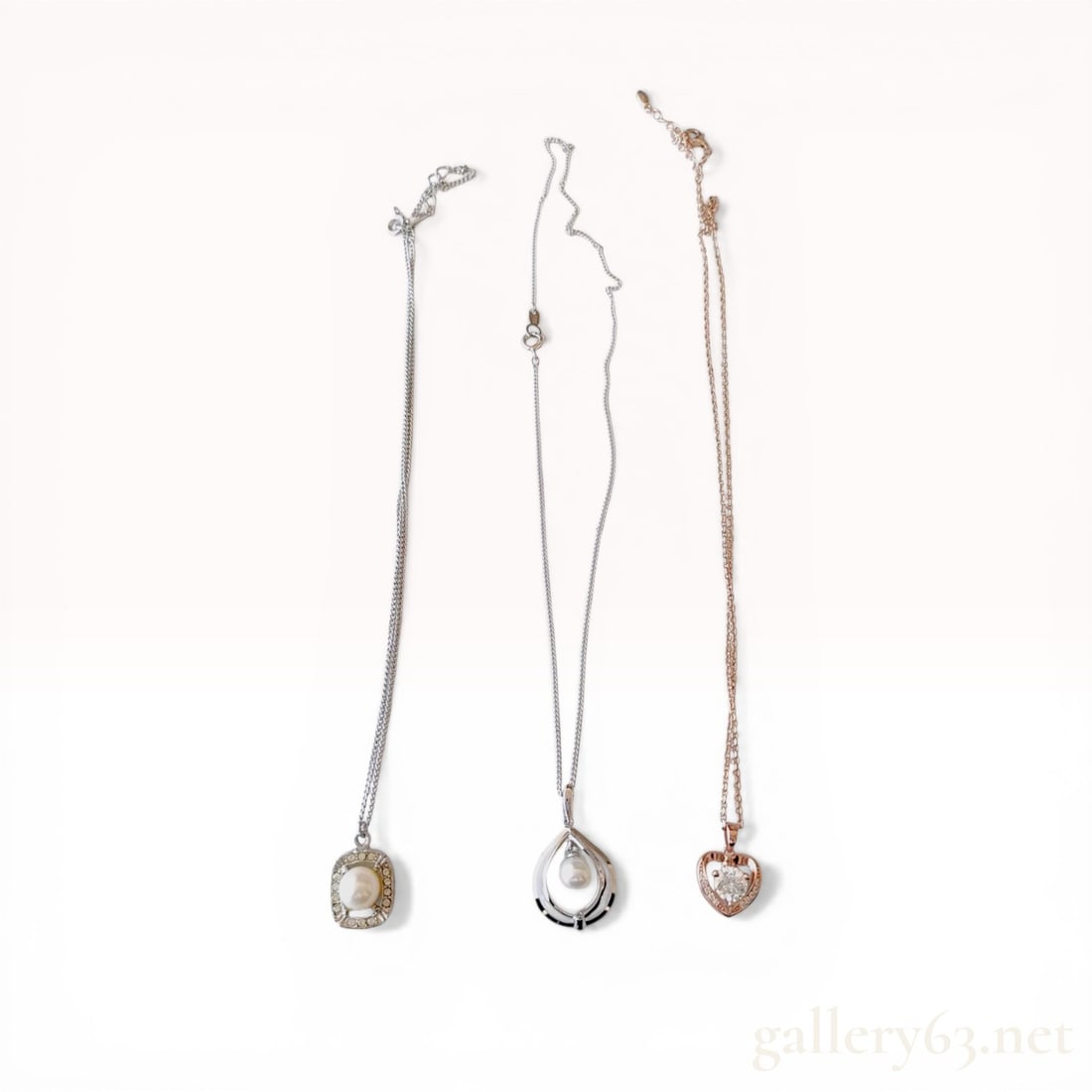 A Trio of Sterling Silver and Cultured Pearl Pendant Necklaces (1 of 9)