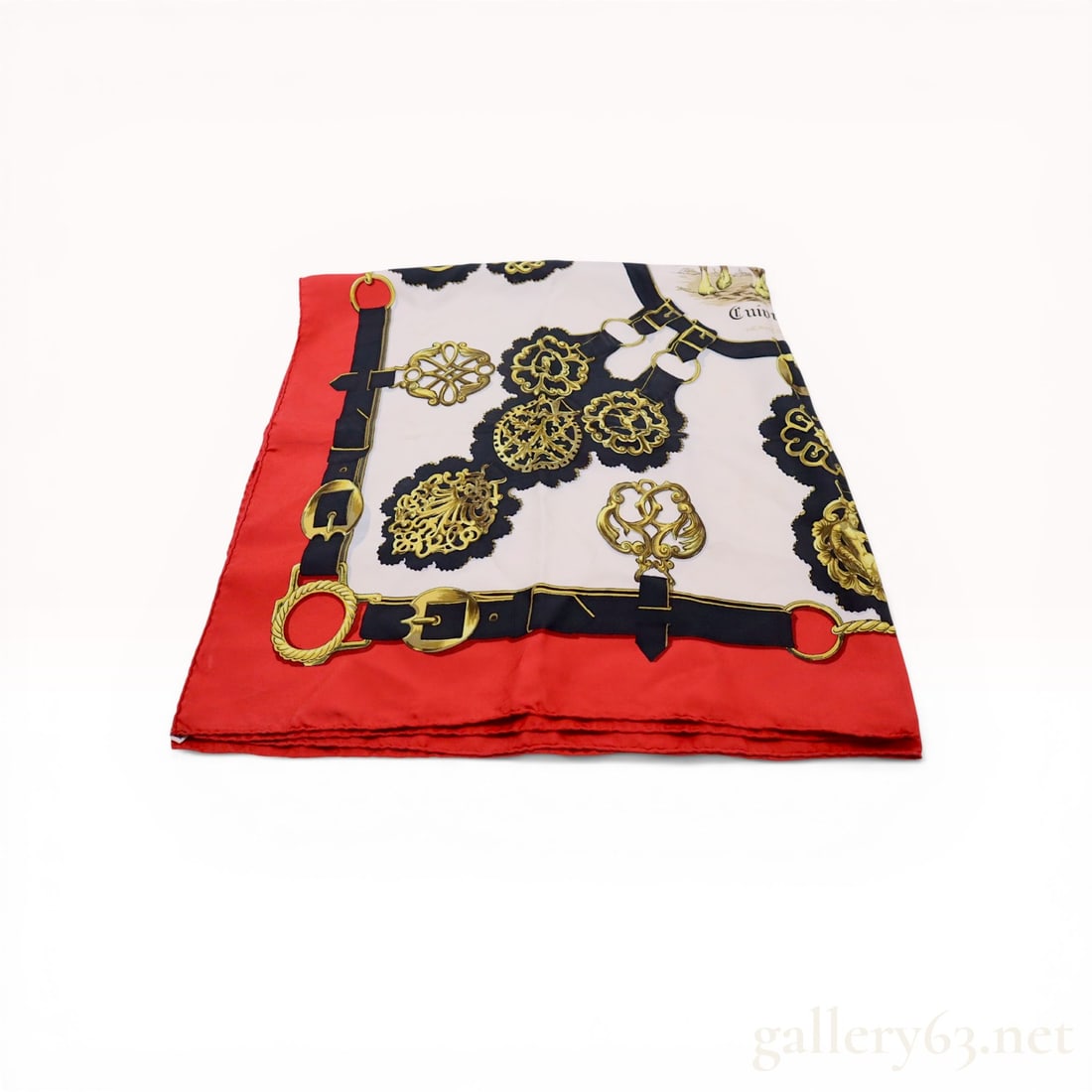 Hermes Les Cuivreries Silk Scarf by Francoise de la Perriere: Hermes silk scarf in the Les Cuivreries pattern, designed by Francoise de la Perriere and originally issued in 1963. The equestrian design features gold-tone horse brasses and buckles connected by bla